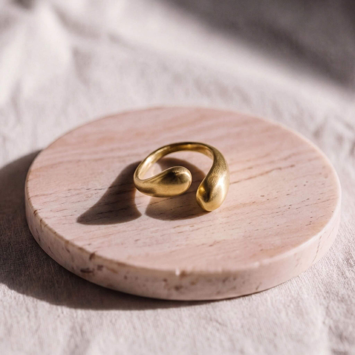 Sana adjustable brass teardrop wrap ring with open ends — EcoDunia