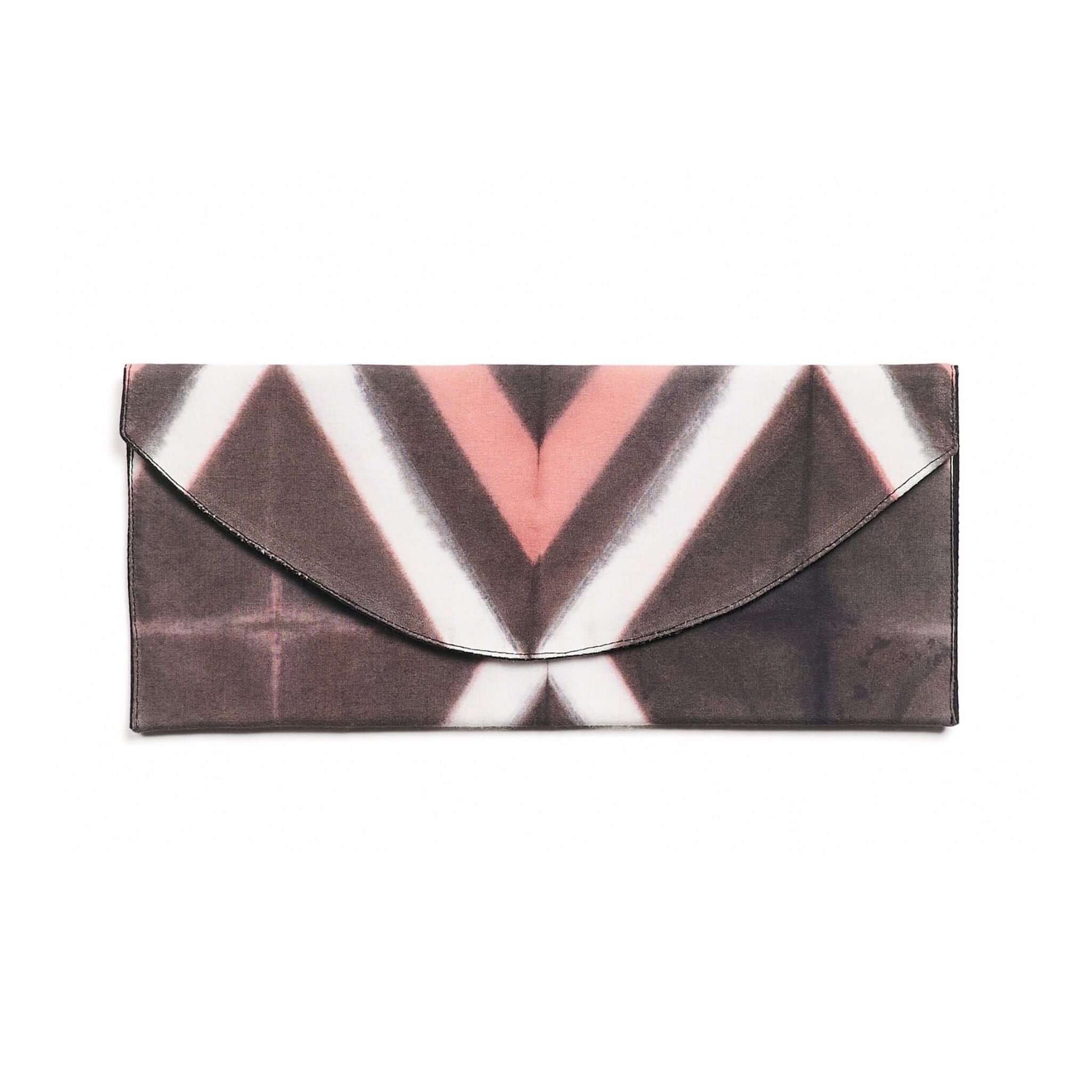 Tisa Artisanal Pouch In Black Pink Triangle Print featuring a unique triangular design in pink and black.