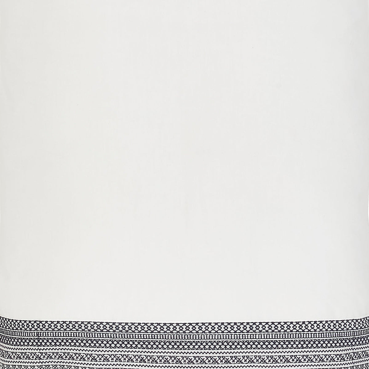 QSS-503-6080_5|Close-up view of crisp white 100% cotton sheet, showcasing an elaborate navy blue embroidered border design.