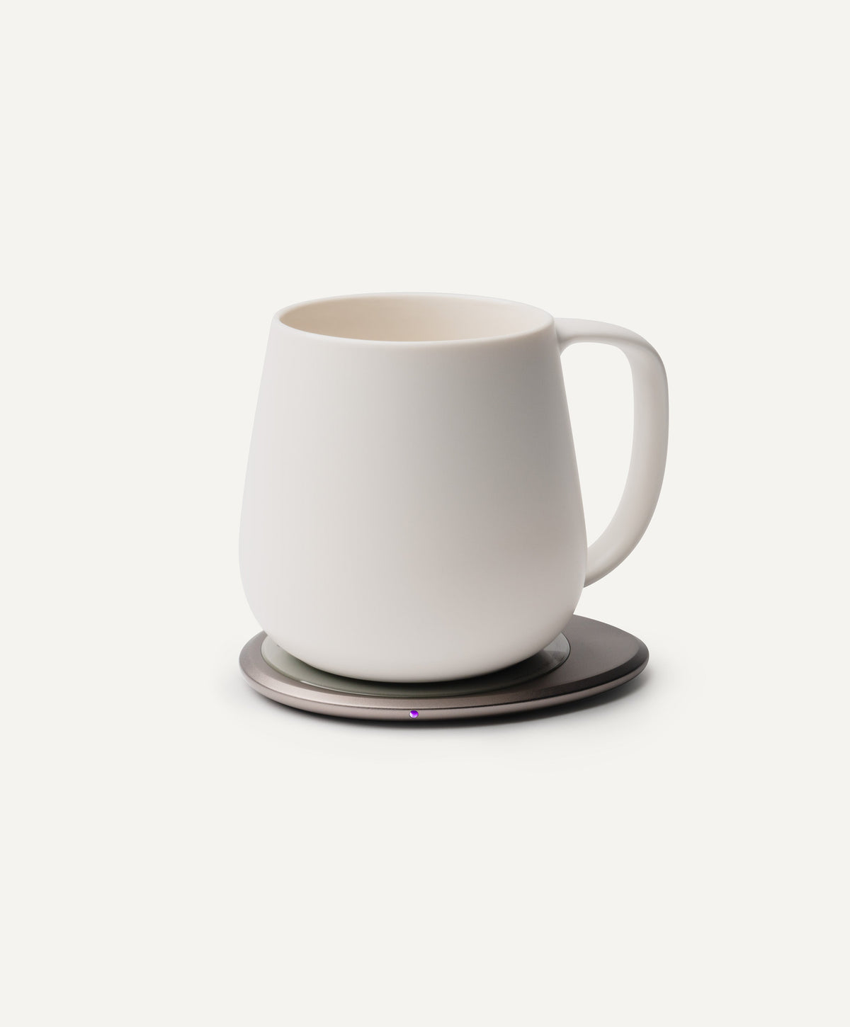 Ui+ Self-Heating Ceramic Mug 18 fl oz / 532 mL in Jasmine White on Ohom Charging Pad 3