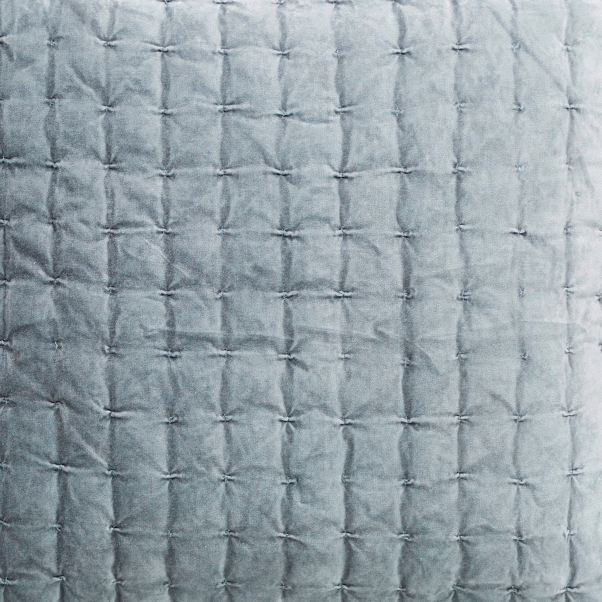 ES-324-2626_2|Close-up of soft grey velvet quilted fabric showcasing a classic grid stitch pattern, ideal for cozy decor.