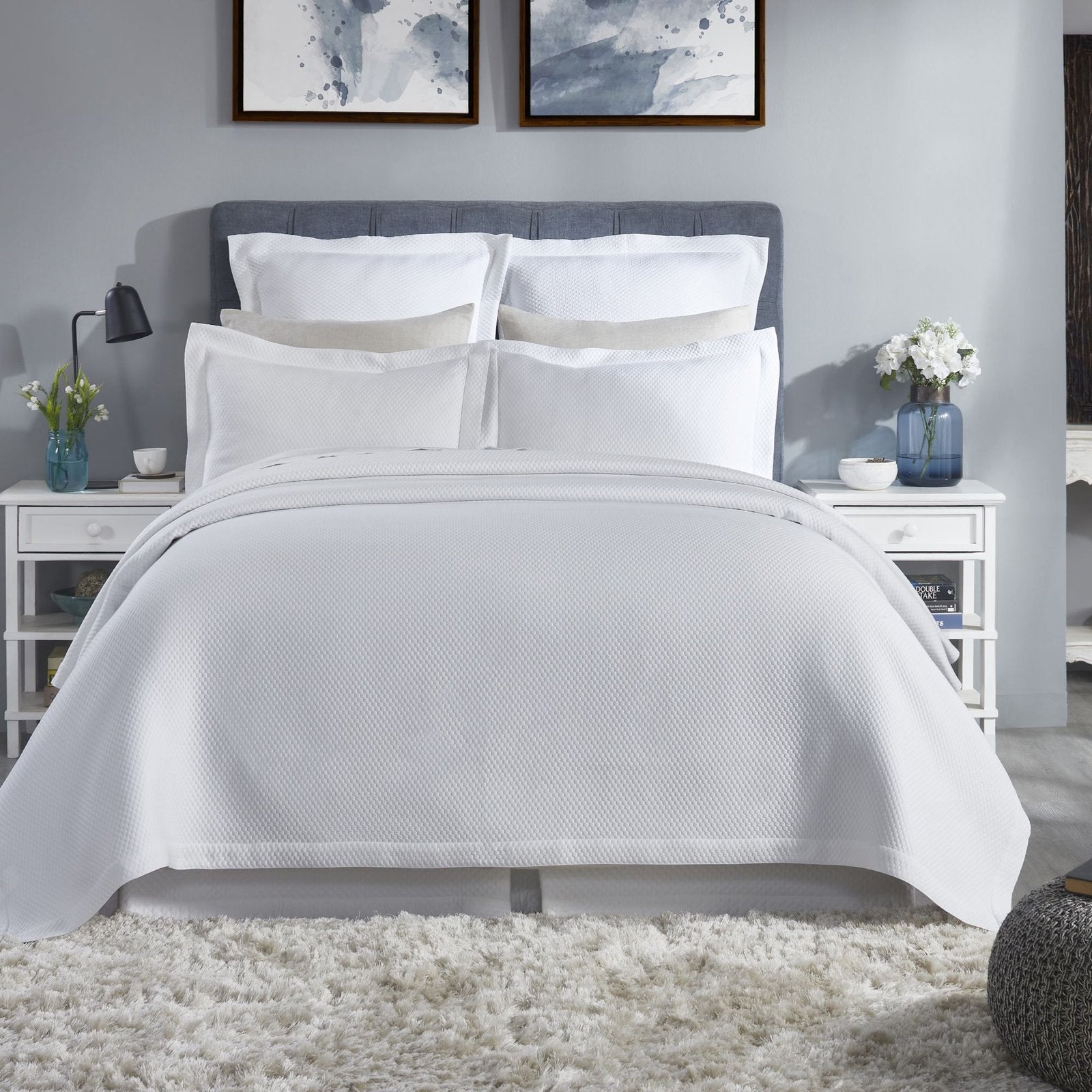 CL-256-11096_1|Crisp white textured coverlet with a modern waffle weave pattern, creating a clean and inviting bedroom aesthetic.