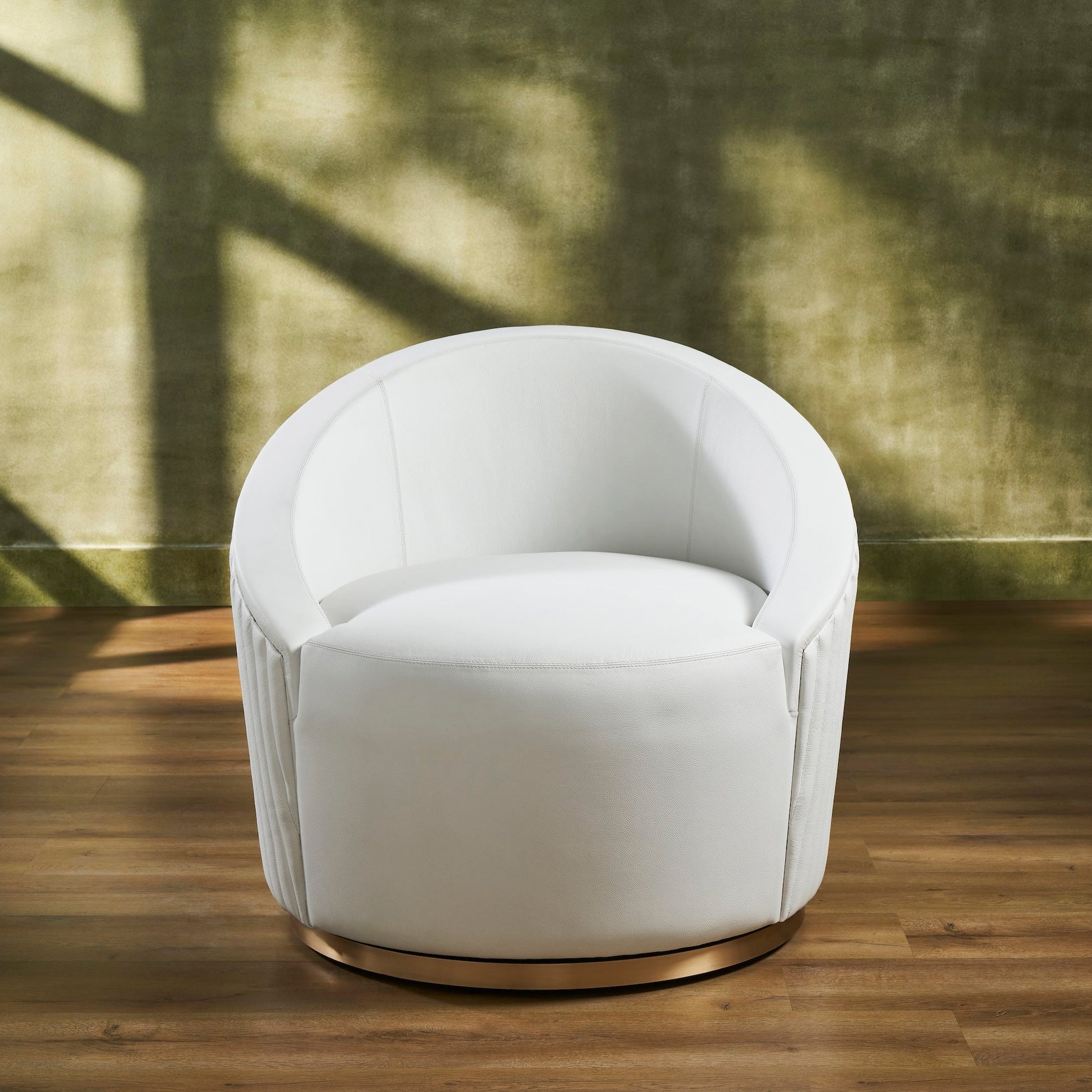 FN-5206-353529_2|Luxurious white leather swivel chair with sleek, comfortable design and a shimmering gold metal round base, perfect for modern spaces.
