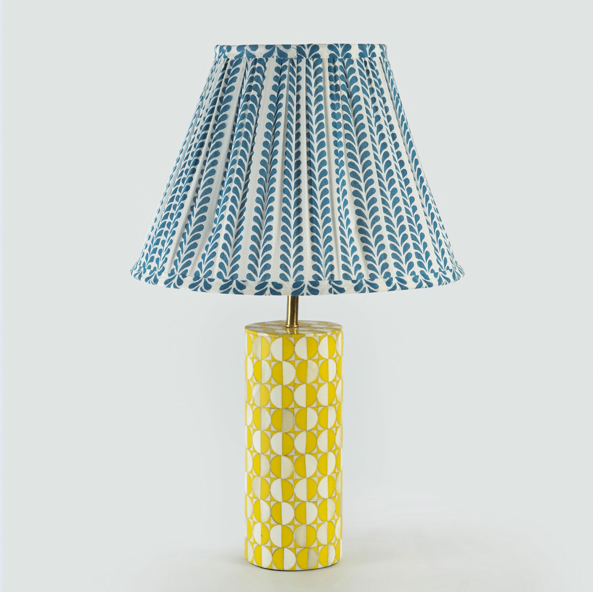 Lampshade styled on bedside table with warm lighting

