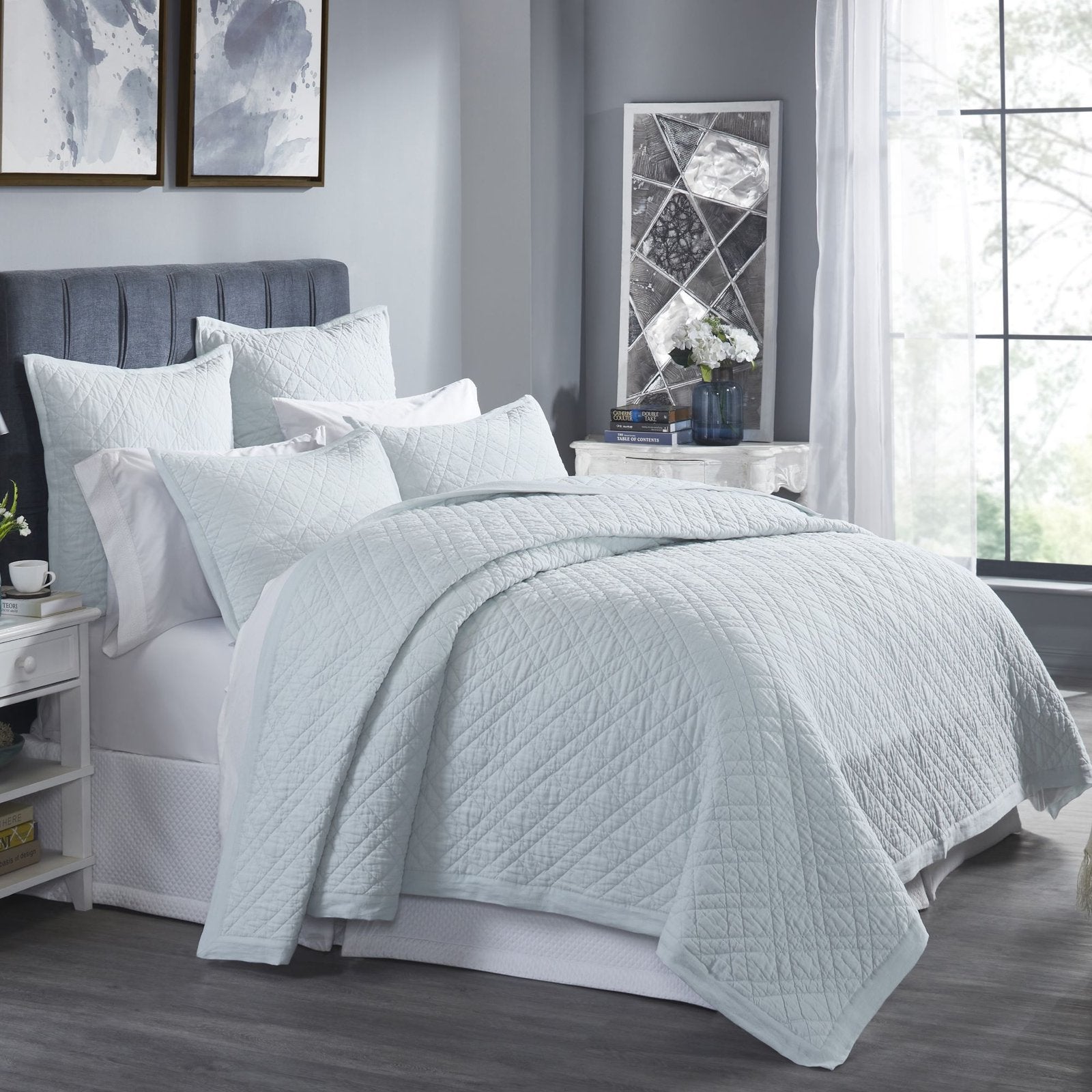 CL-255-11096_2|Serene light blue quilted coverlet dressing a modern bedroom, featuring a subtle diamond pattern for stylish comfort.