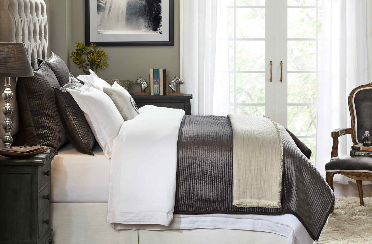 CL-153-11096_5|Luxurious charcoal grey velvet ribbed coverlet with intricate braided texture, adding refined comfort to the bedroom setting.