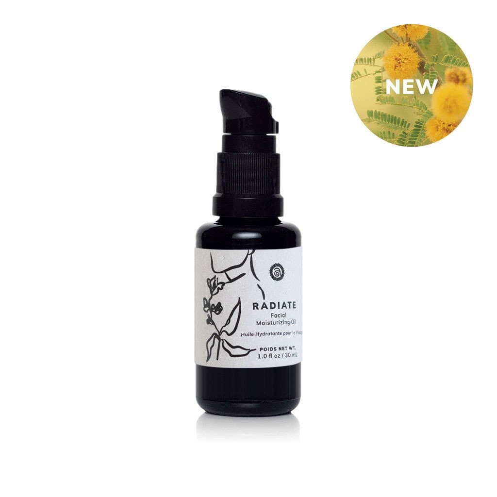 Radiate Facial Moisturizing Oil in a dark glass pump bottle on a clean white background with a “New” botanical badge highlighting the product.