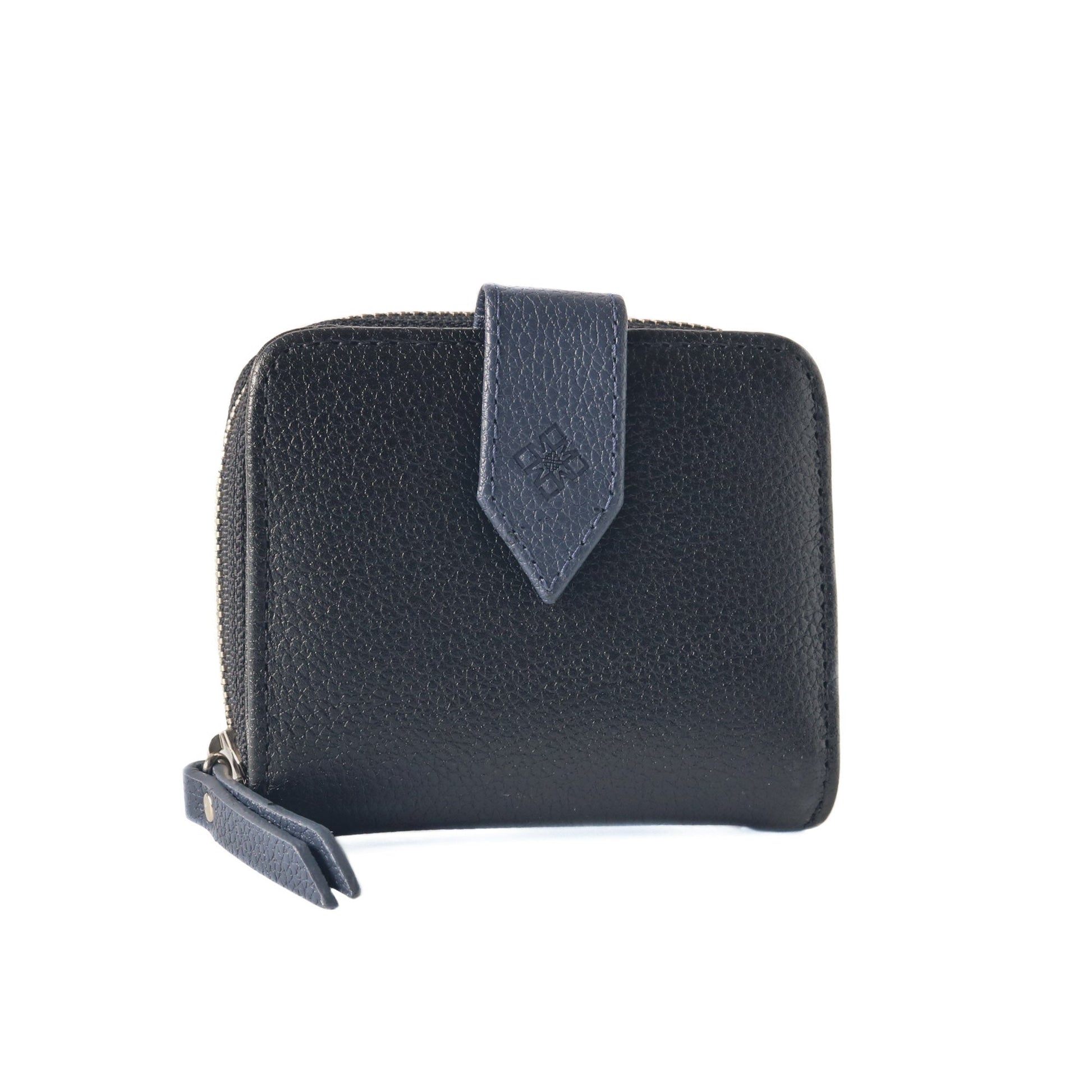 Embossed Tin Marin logo and signet detail on closure flap