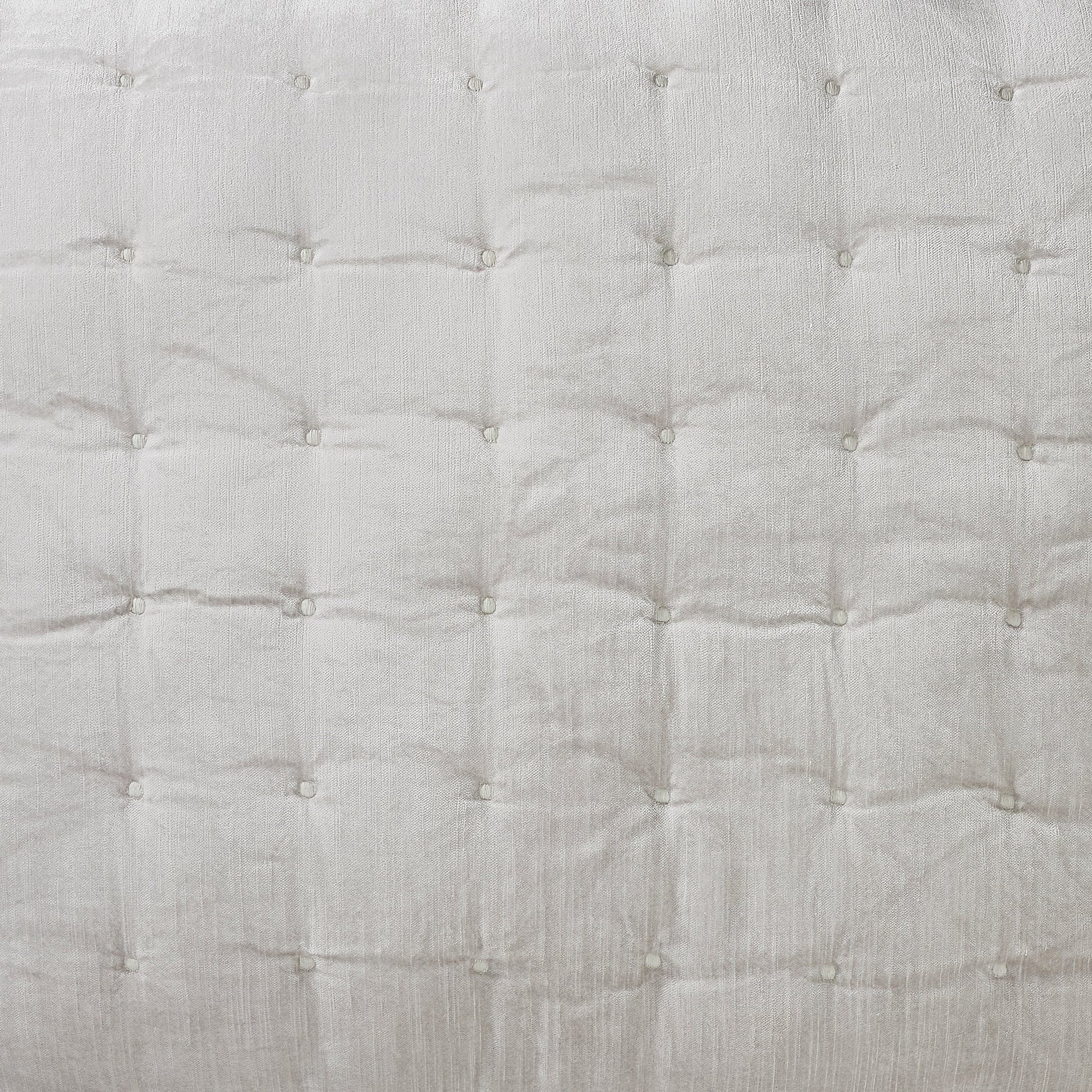QT-306-9496_5|Close-up of light grey tufted quilt texture, highlighting square quilting. Soft, elegant fabric for sophisticated bedroom bedding.