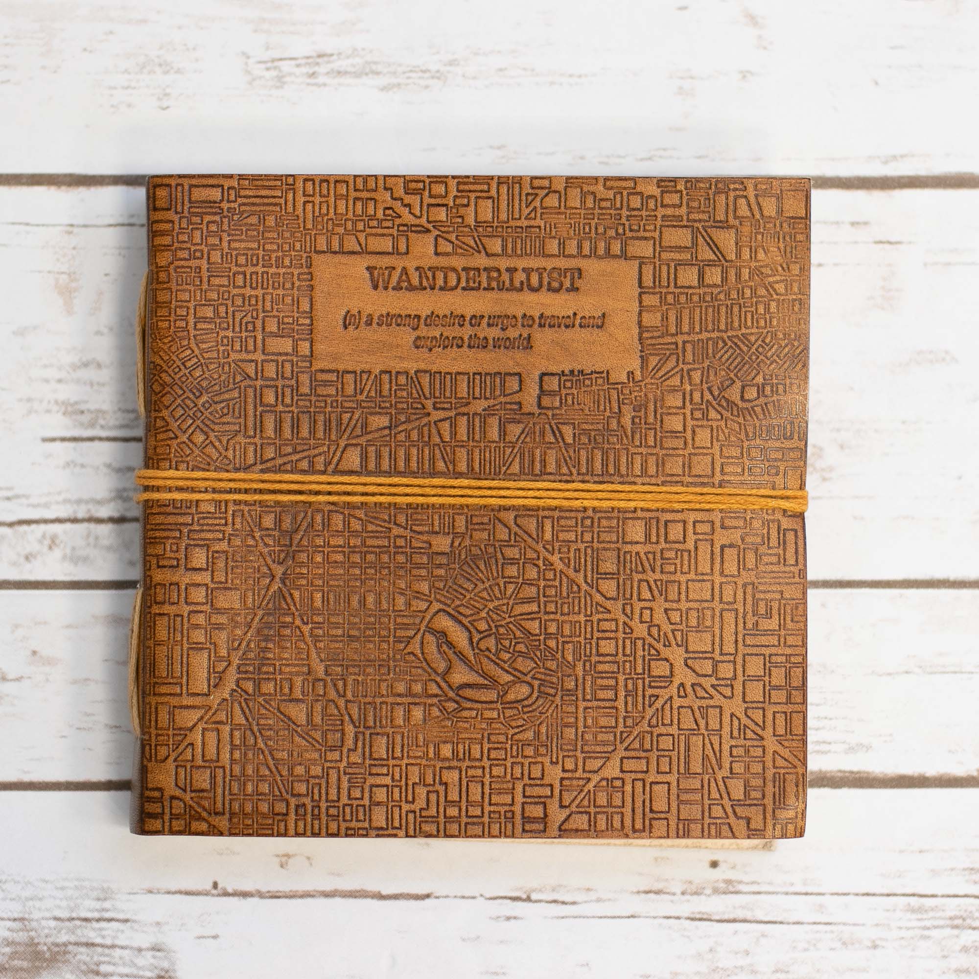 Leather journal with “Wanderlust” engraving – travel-inspired, handcrafted notebook for writing, sketching, and adventure journaling