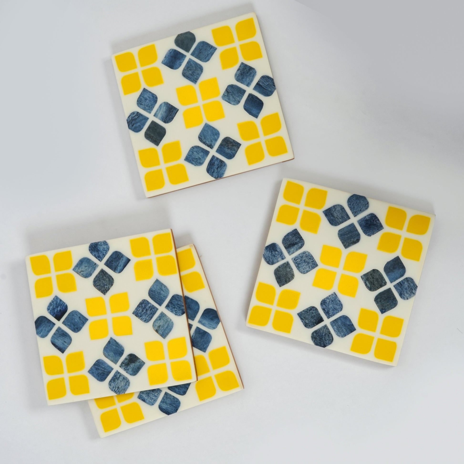 close-up handcrafted bone inlay marigold mosaic pattern coaster