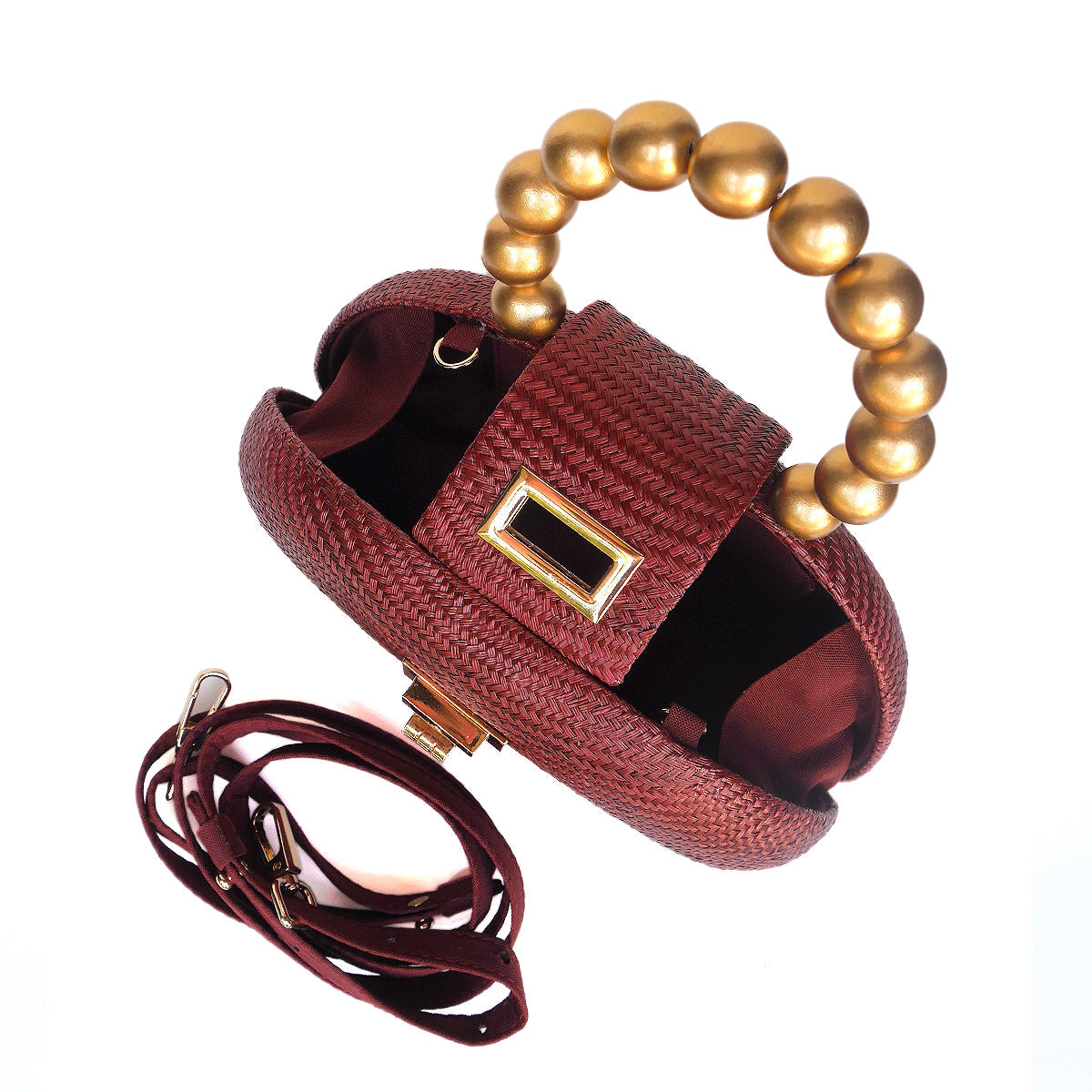 The Orla maroon bag open, showing lined interior and detachable crossbody strap
