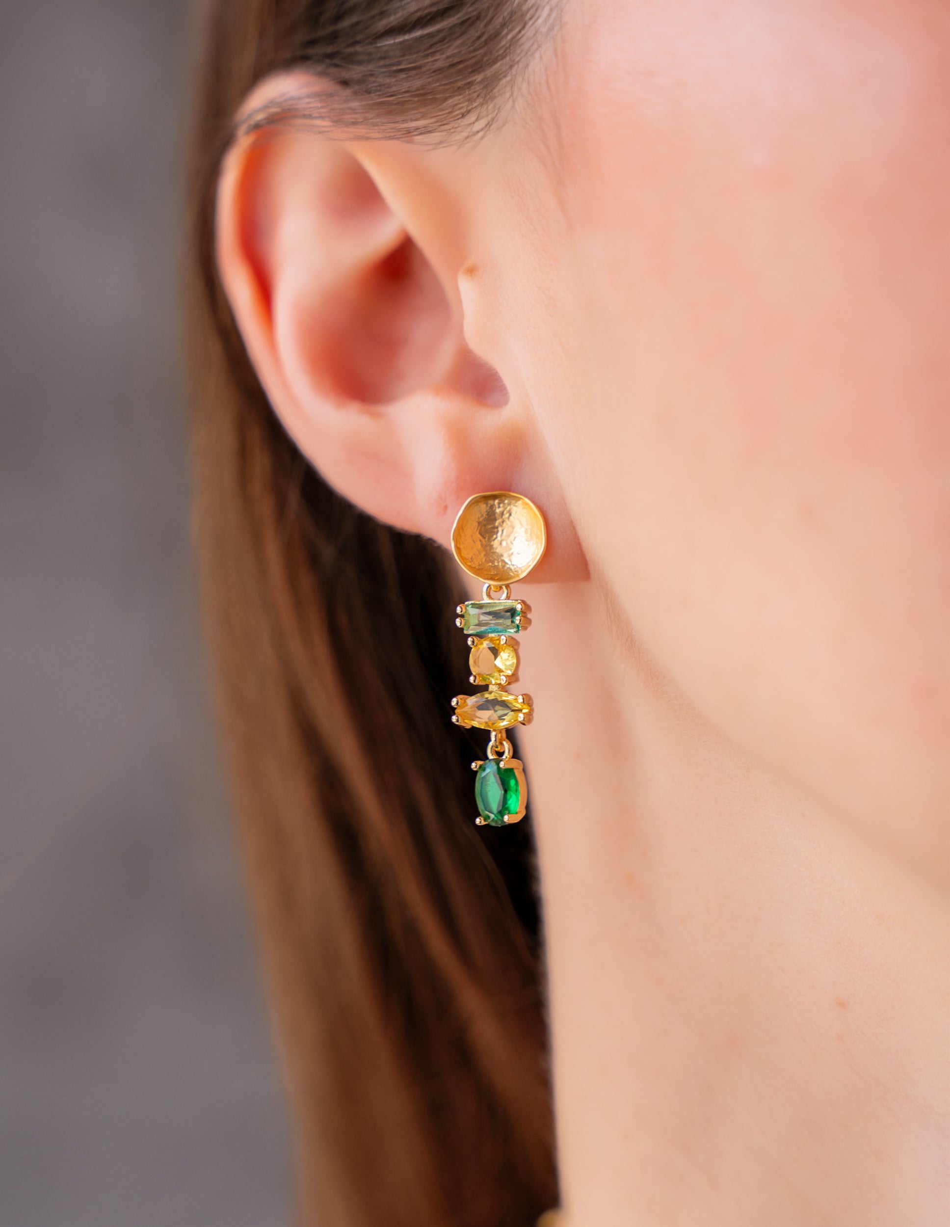 Green and yellow multi gemstone drop earrings with hammered gold stud tops.