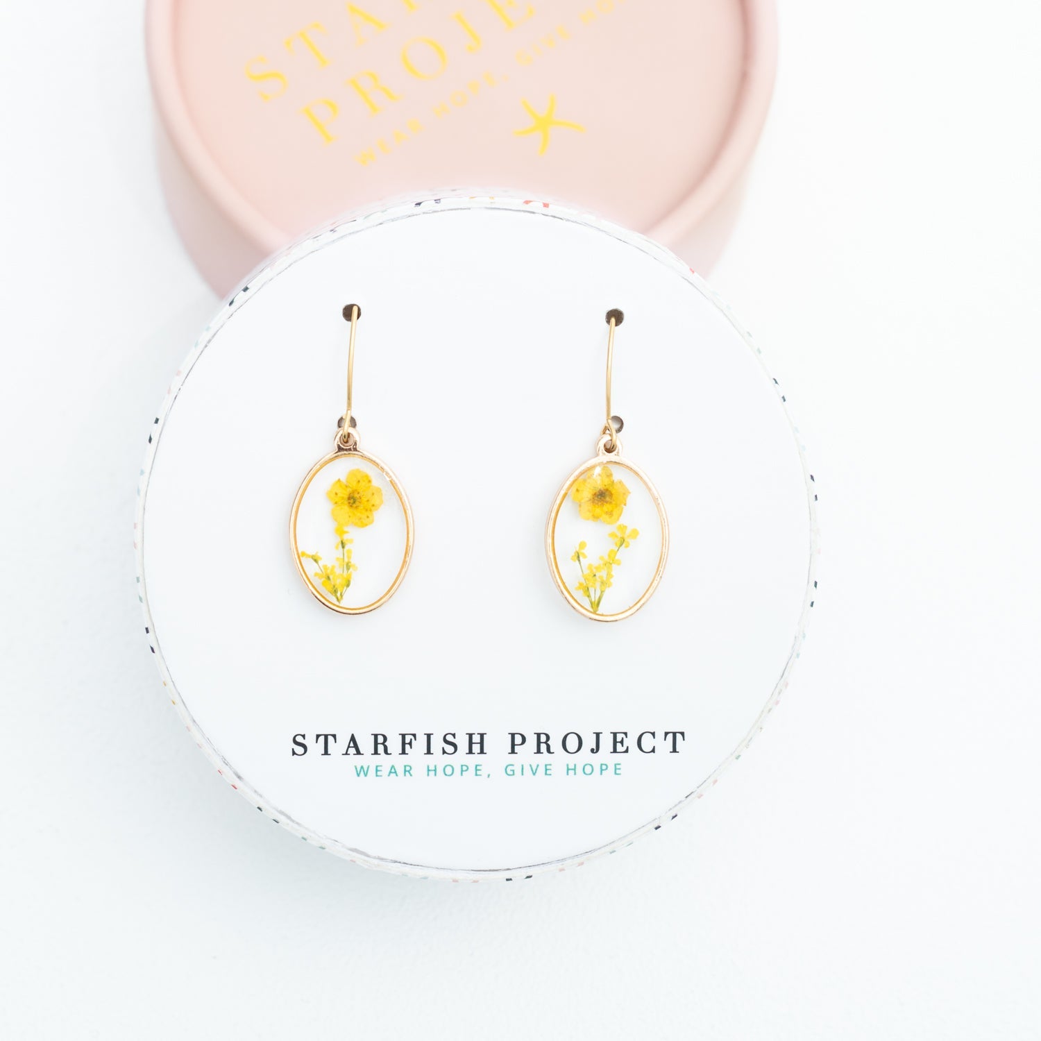 Gift box with gold flower earrings, fair trade gifting company, gift ideas for the holidays 