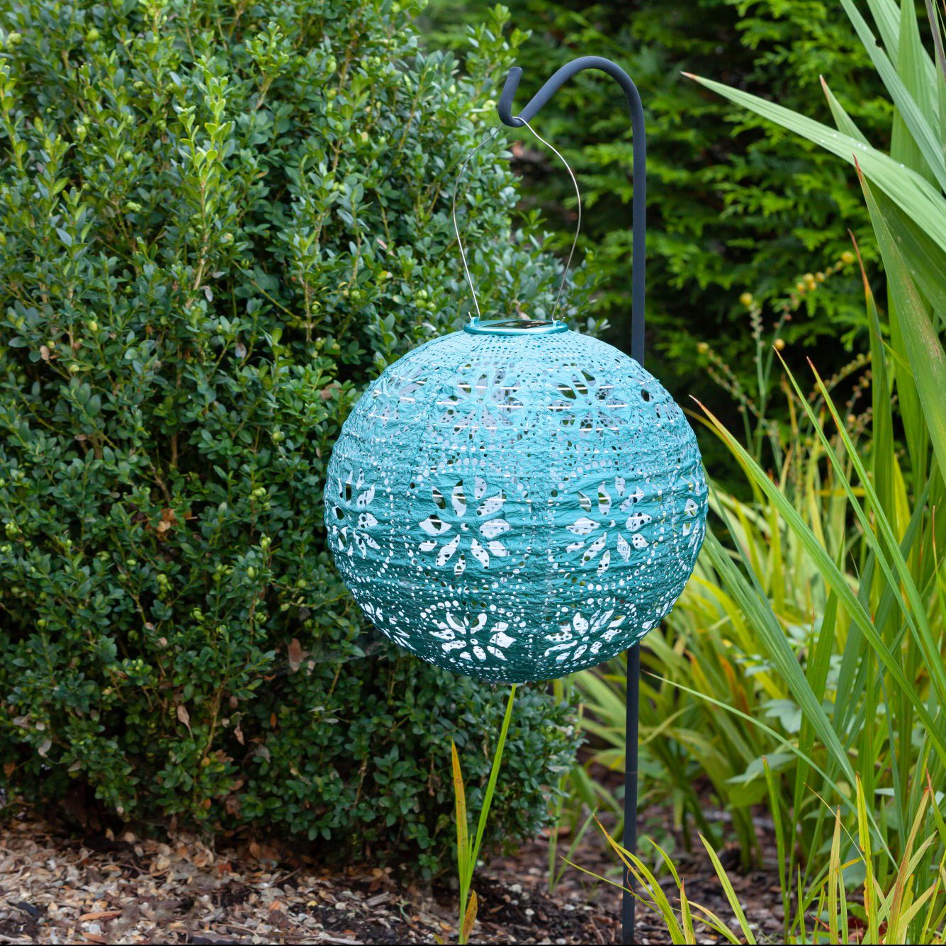 Soji Stella Boho Tyvek Solar Lantern in garden