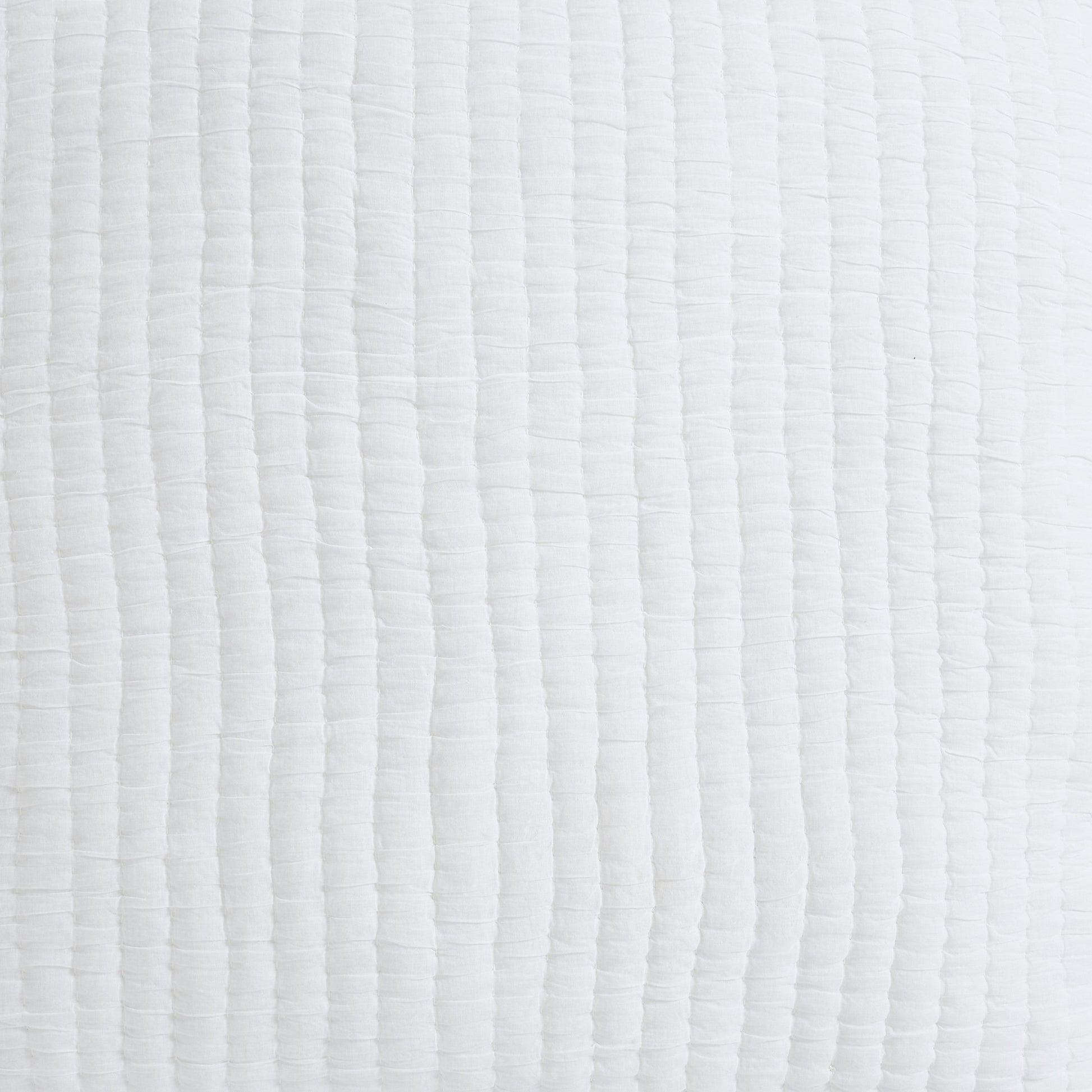QT-359-11096_9|Fresh white vertical channel quilted bedspread, providing contemporary style and breathable coziness for a serene sleep.