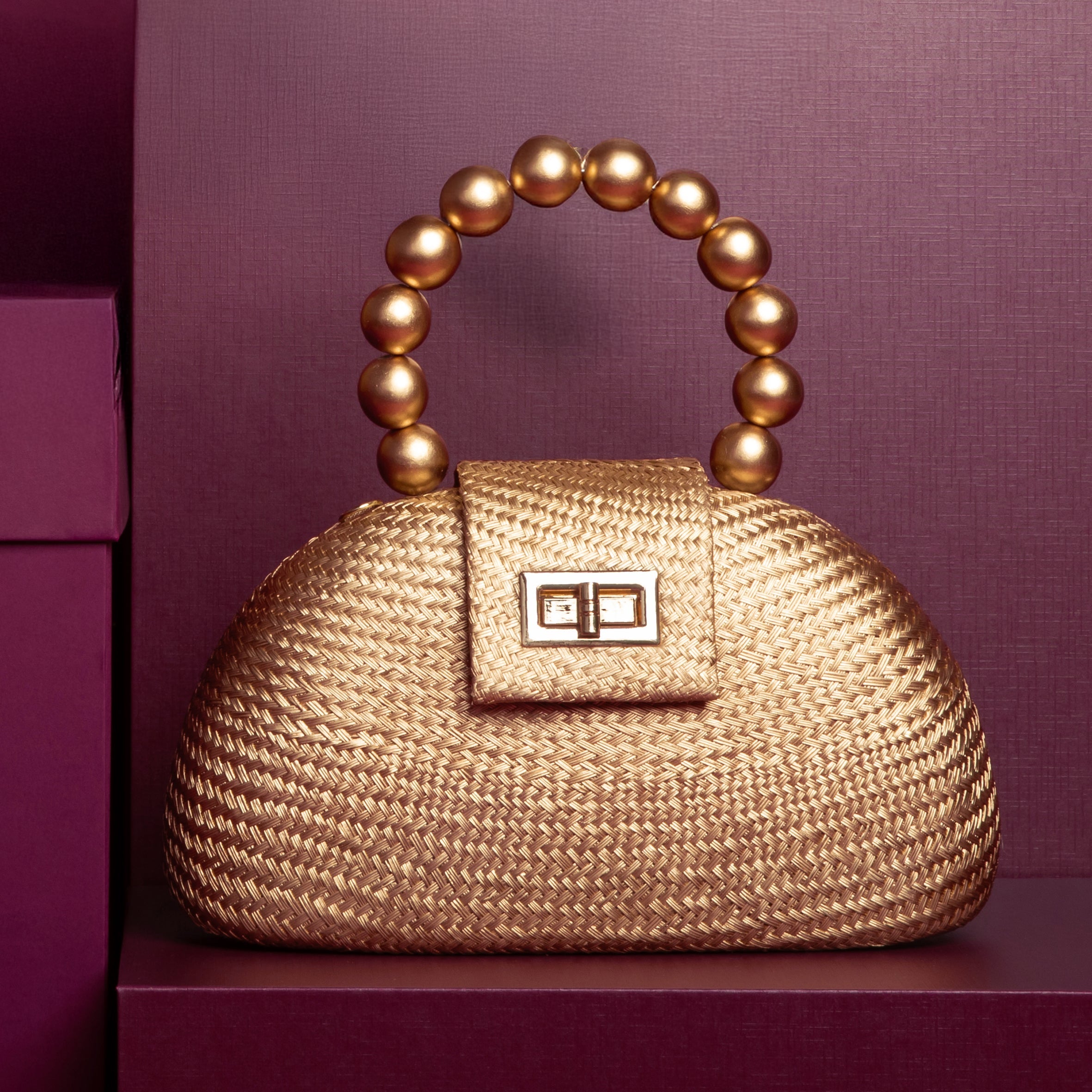 THE ORLA Gold Woven Straw & Wooden Bead Statement Clutch Bag