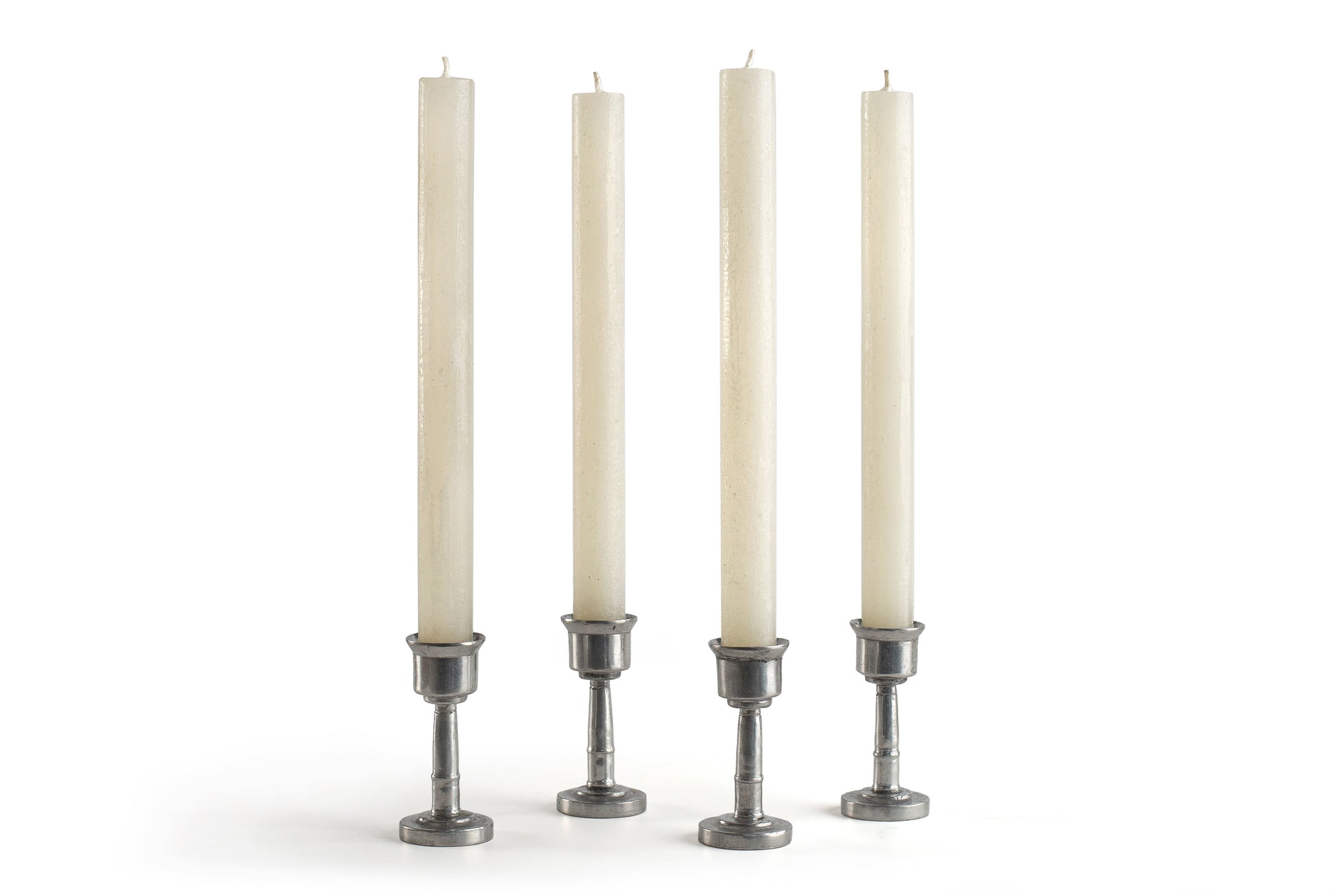 4 cream frosted tapers in pewter taper holders.  Hand crafed in South Africa