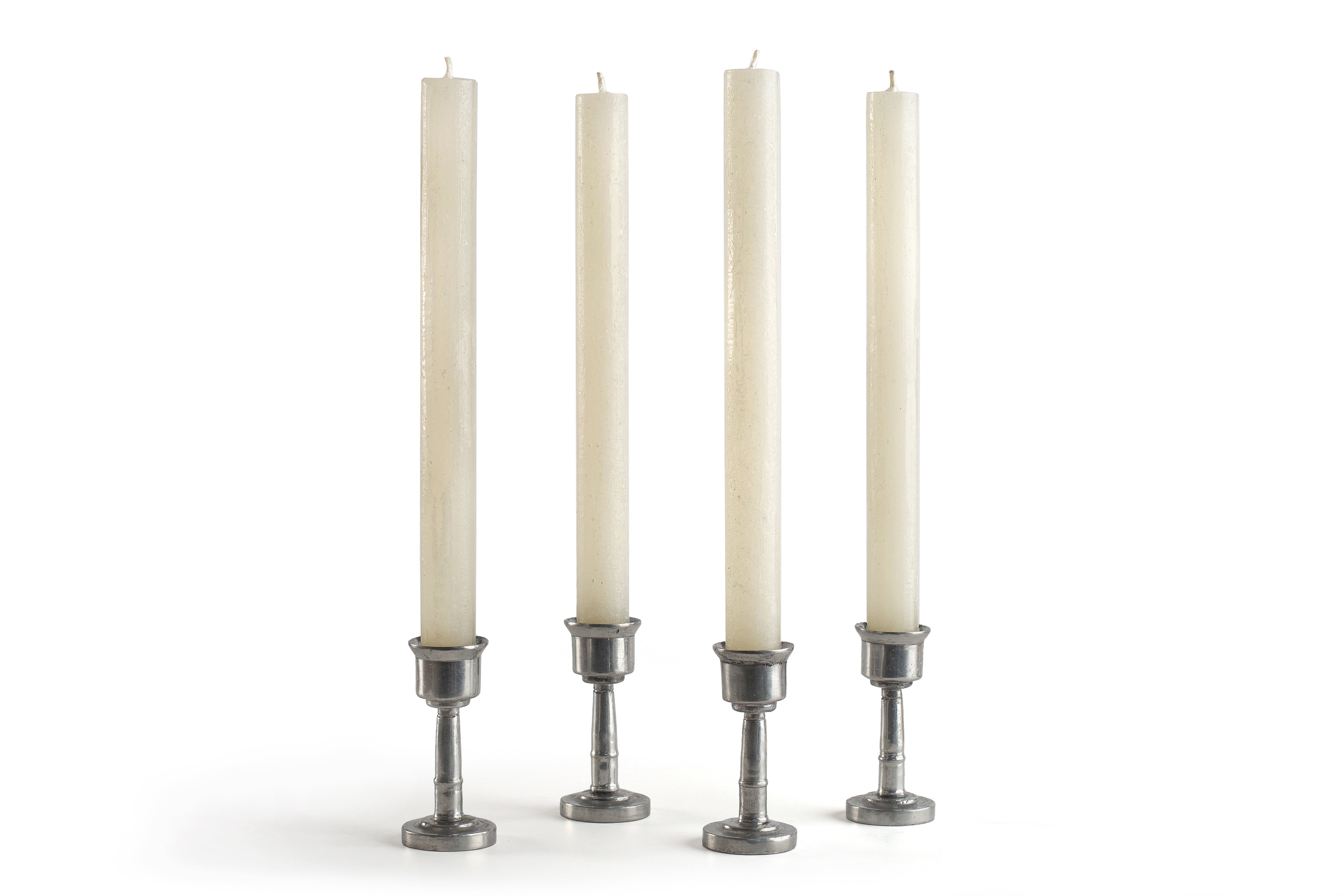 4 cream frosted tapers in pewter taper holders.  Hand crafed in South Africa