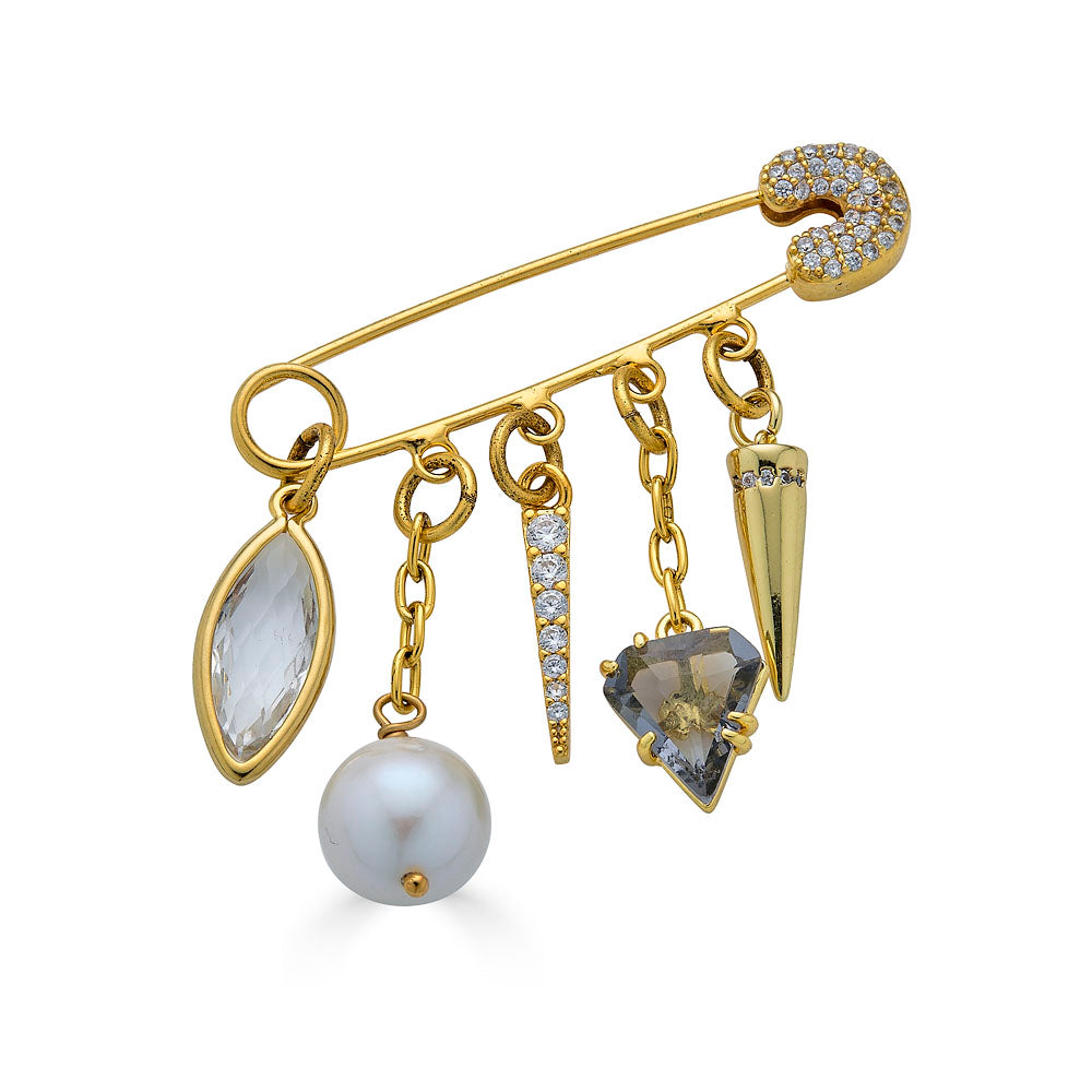 Gold brooch with dangling charms including marquis crystal, pearl, pave spike, smoky quartz triangle, and gold spike