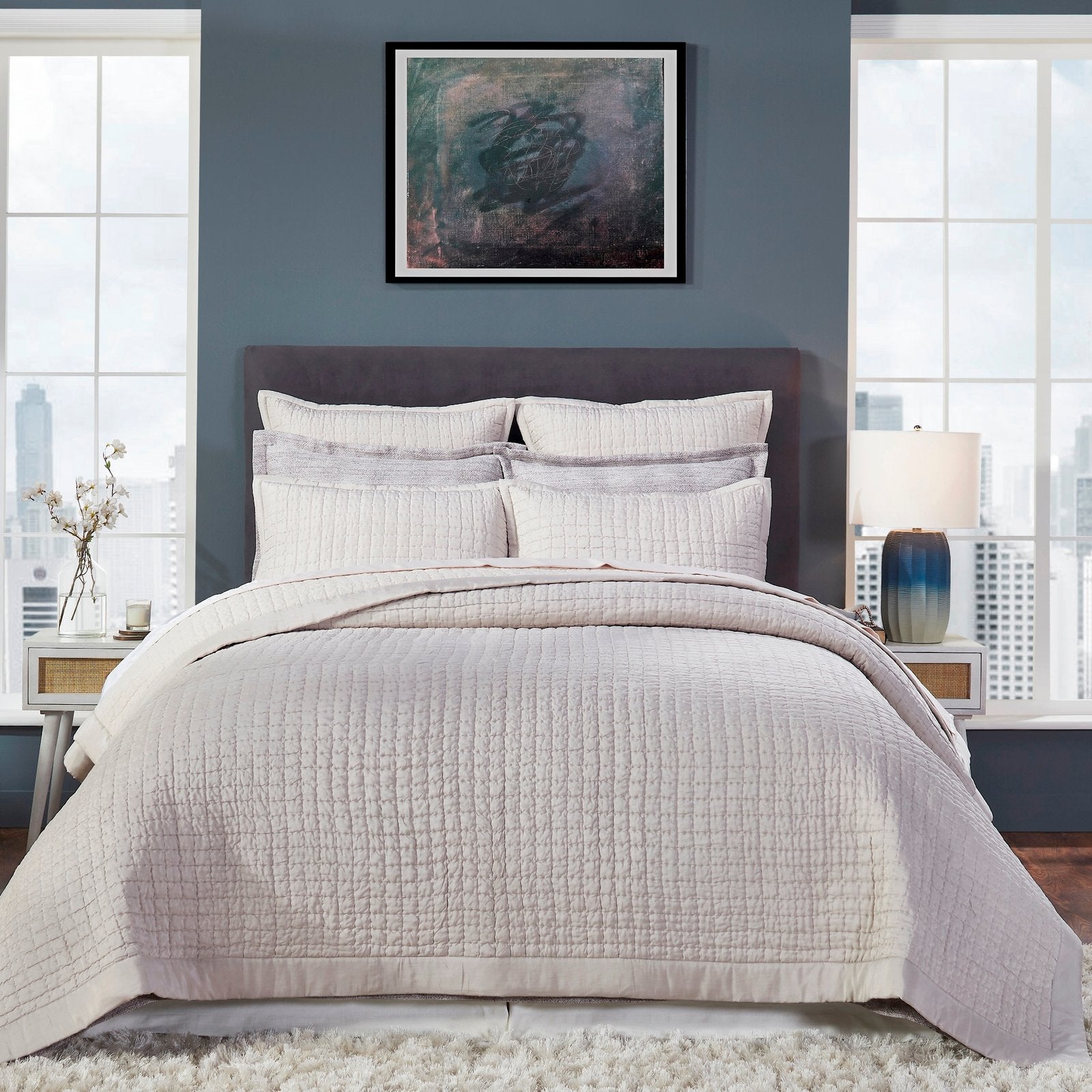 CL-178-9496_1|Cozy beige grid quilted coverlet adds warmth and modern style to a serene bedroom, offering soft, inviting comfort.