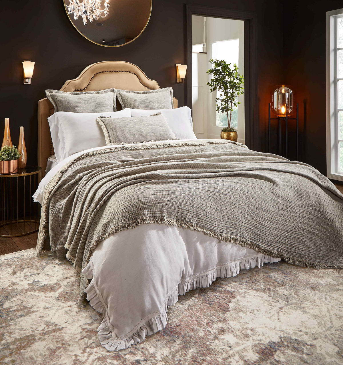 BT-113-11096_1|Gray textured blanket draped over a bed with white linen, creating a cozy and inviting bedroom ambiance.