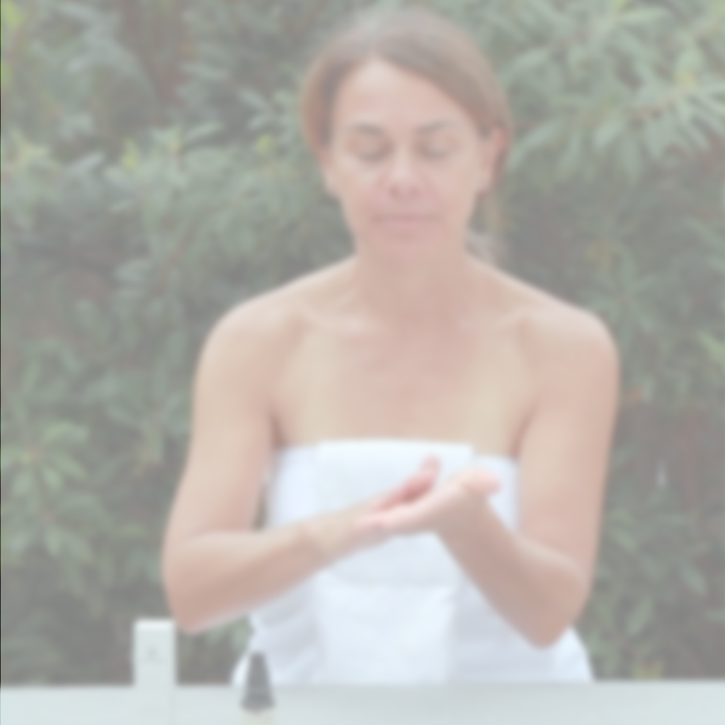 Video demonstration of applying Annmarie Skin Care Anti-Aging Serum to face during a skincare routine.
