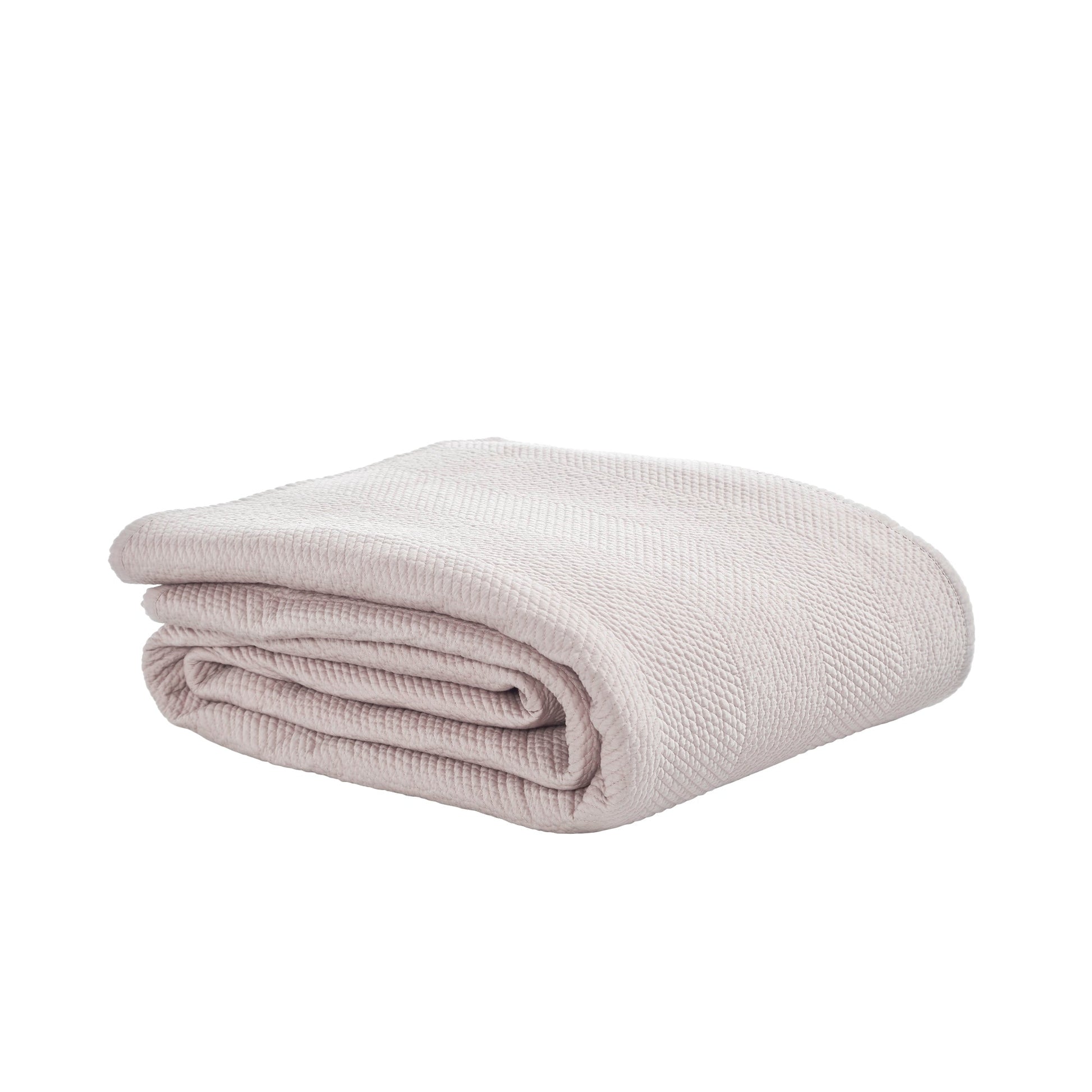 CL-171-11096-LOT1A_7|Folded light beige herringbone textured coverlet, a versatile and soft bedding layer for contemporary homes.