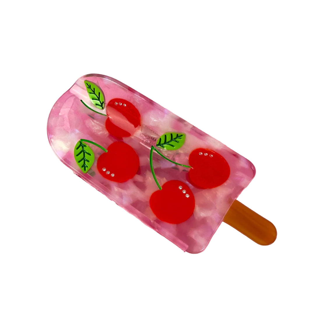 Cherry popsicle hair claw, stay cool with this delicious hair accessory from Centinelle. Handmade on cellulose acetate, with splice technique, exquisite miniature details and crystals, that are tied directly to its value and make them unique and special. 