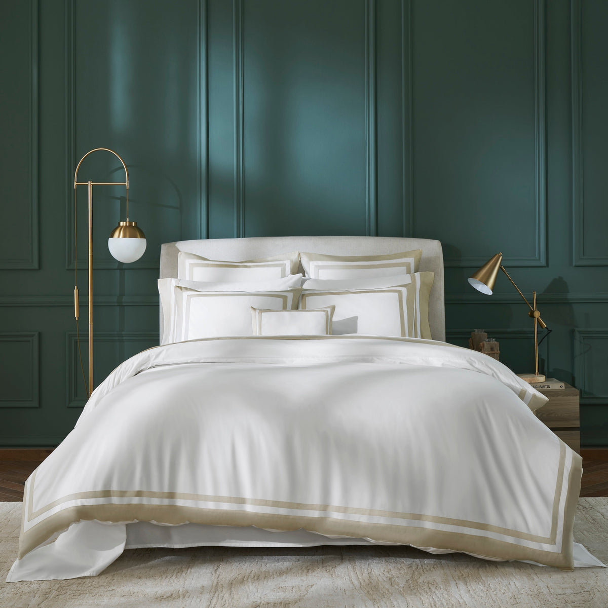 DT-069-9092_3|Overhead view of a bed with a neatly folded white duvet cover, prominent navy blue border details, and matching pillow shams.