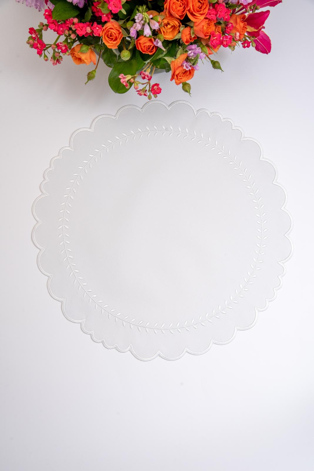Arrow impermeable placemat with geometric border design in white by Talah Home