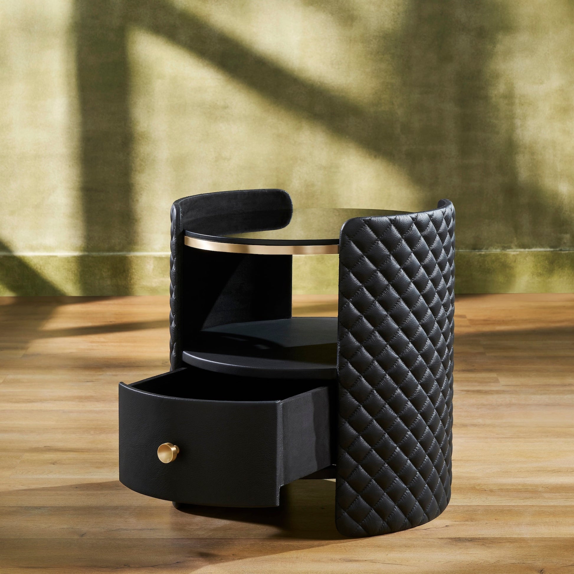 FN-5215-202022_3|Functional black quilted leather nightstand with open drawer, a modern luxurious side table providing stylish bedroom storage.