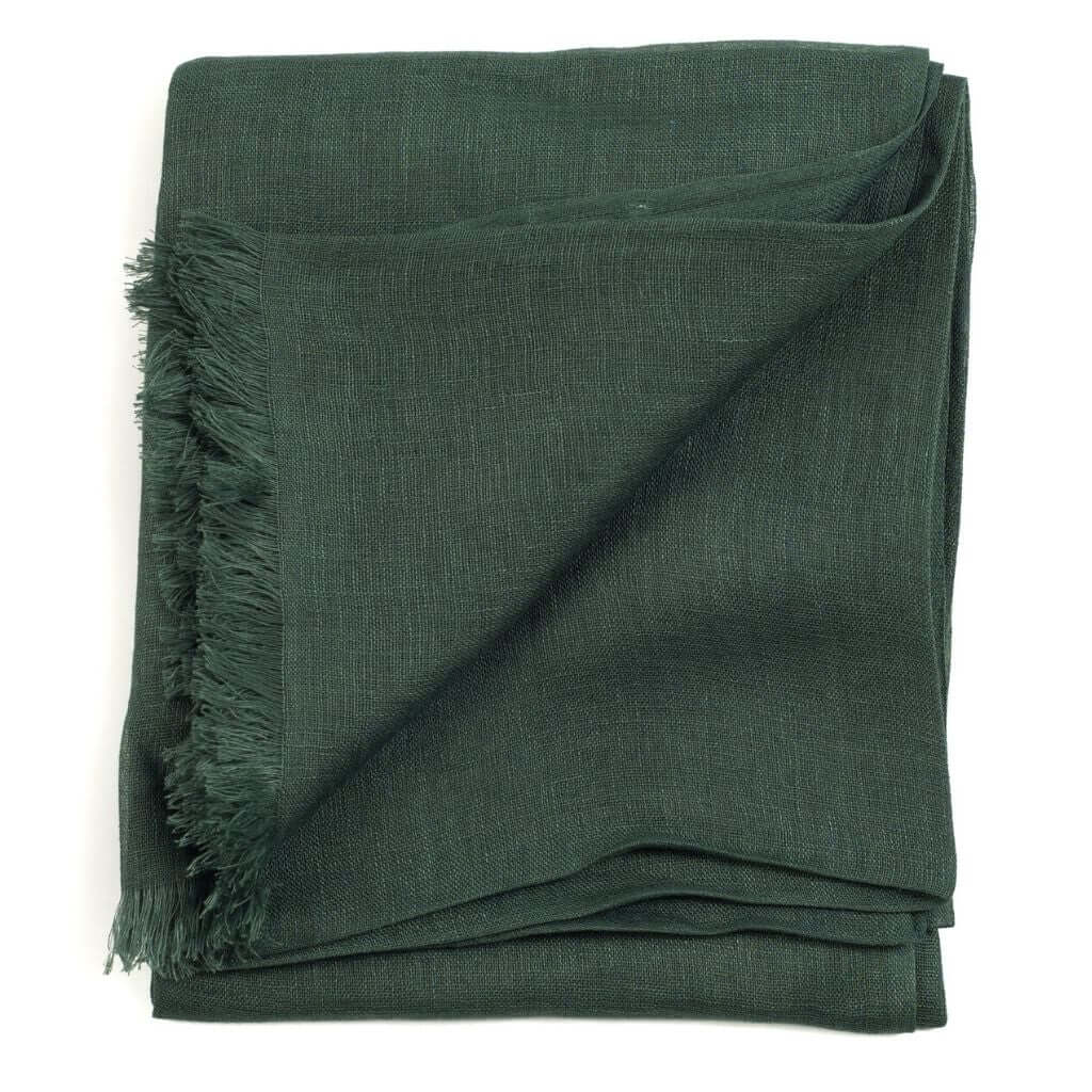 Coco Brown Hand Woven Linen Silk Blend Scarf folded neatly, showcasing its soft texture and elegant design.