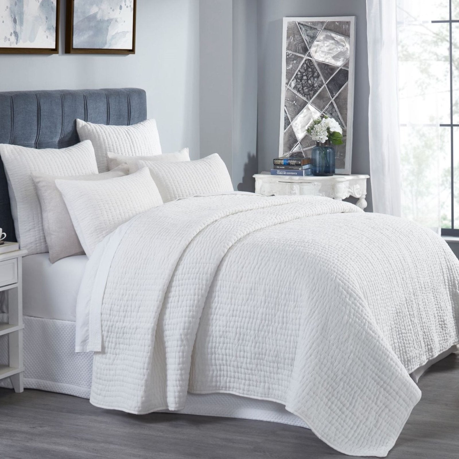 QT-359-9496_2|Crisp white textured quilt set on a bed, providing a fresh, serene look and comfortable, breathable layer.
