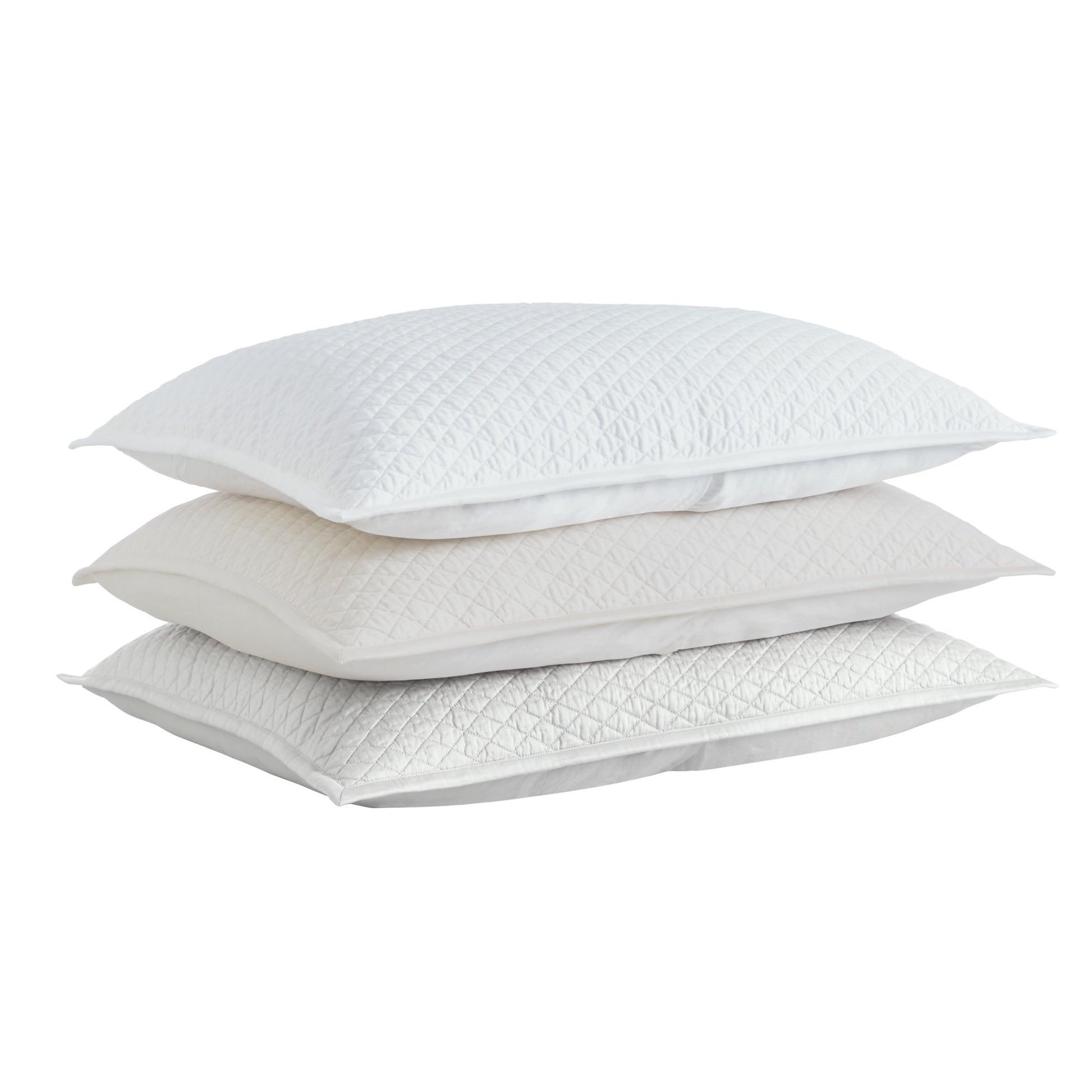 SS-264-2026_3|Stack of white, cream, and grey quilted coverlets with diamond pattern. Versatile bedding options for elegant bedroom styling.