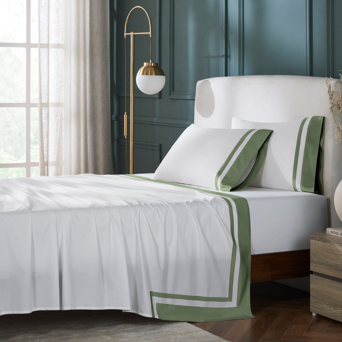 KFL-542-7880_1|White 100% cotton sheets with green border and white stripes, covering a bed in a modern bedroom. Includes matching pillows.