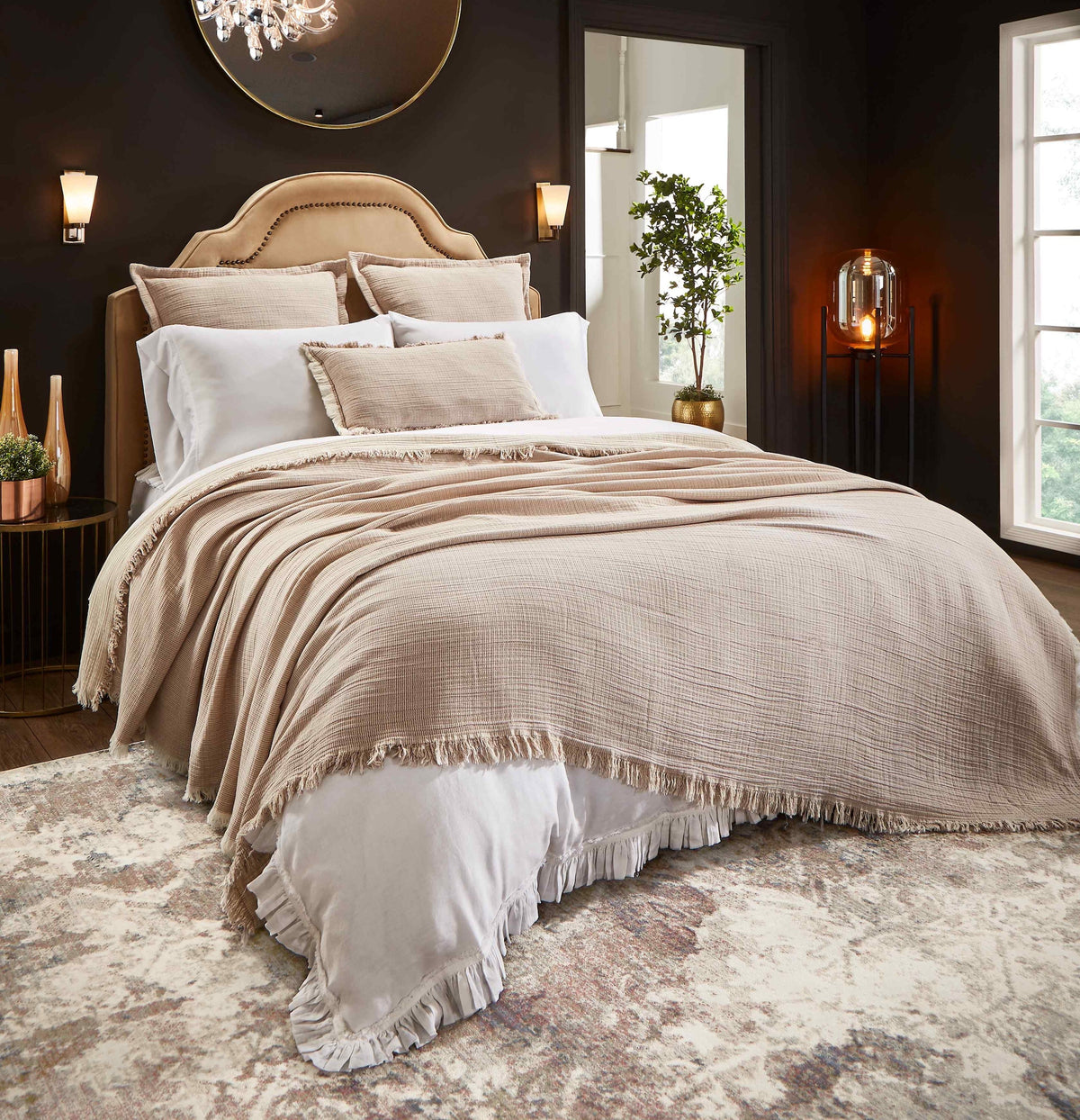 BT-112-11096_1|Elegant, textured light brown blanket with fringe detail covers a luxurious bed, enhancing bedroom comfort and style.