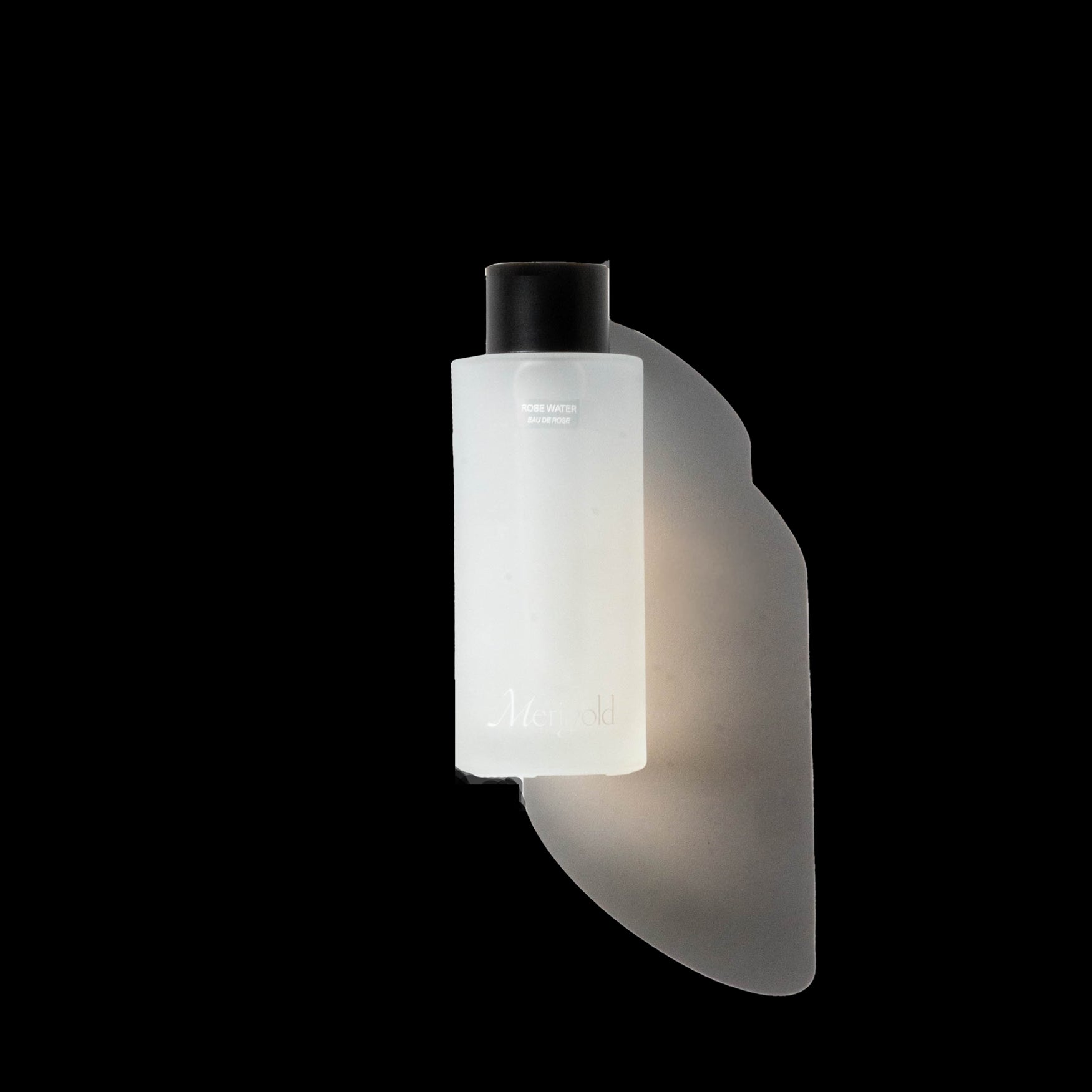 Merigold Rose Water in frosted glass bottle – soothing, softening floral water toner for dry, sensitive, or combination skin. Plant-based skincare for gentle hydration.