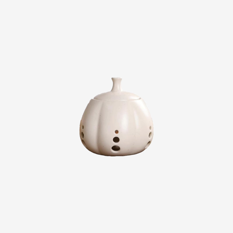 Sustainable ceramic garlic keeper jar in beige, eco-friendly and luxury kitchen storage solution