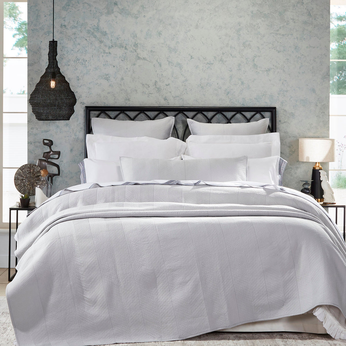 CL-172-9496_1|Elegant light grey quilted coverlet with a modern herringbone pattern on a serene bed in a stylish bedroom setting.