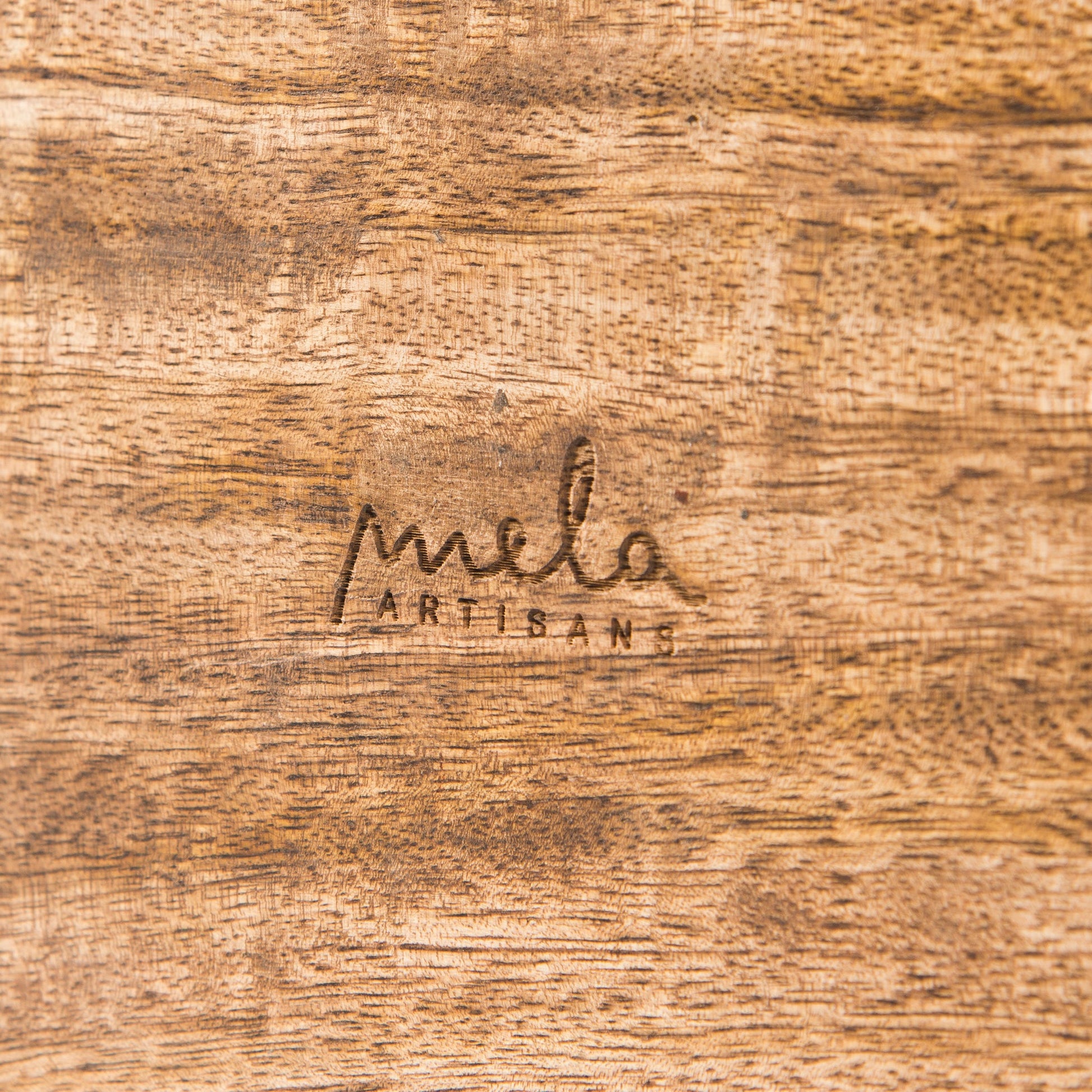 close-up of geometric trellis carving and medium burnt finish on mango wood keepsake box