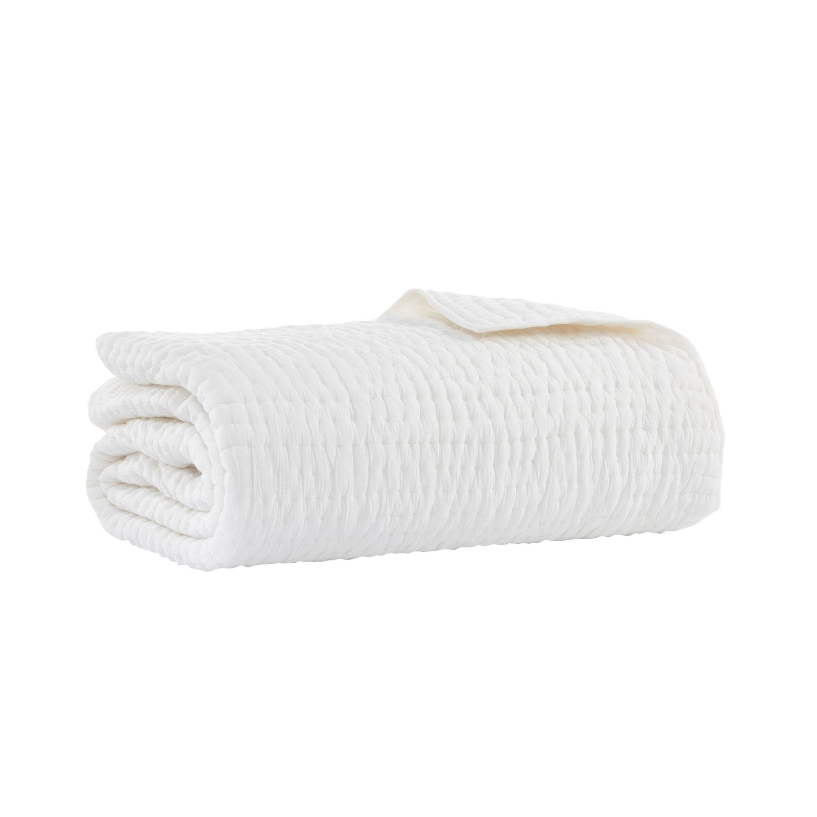 QT-359-9496_6|Neatly folded soft white textured quilt, ready to provide warmth and comfort, ideal for any cozy bedroom setting.