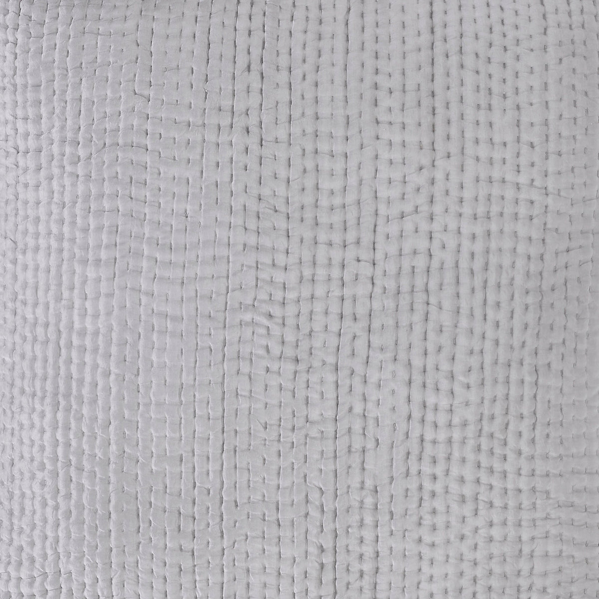 ES-156-2626_3|Close-up of a light grey quilted coverlet fabric. Features a small, dense grid pattern with prominent vertical stitching and soft, woven texture.