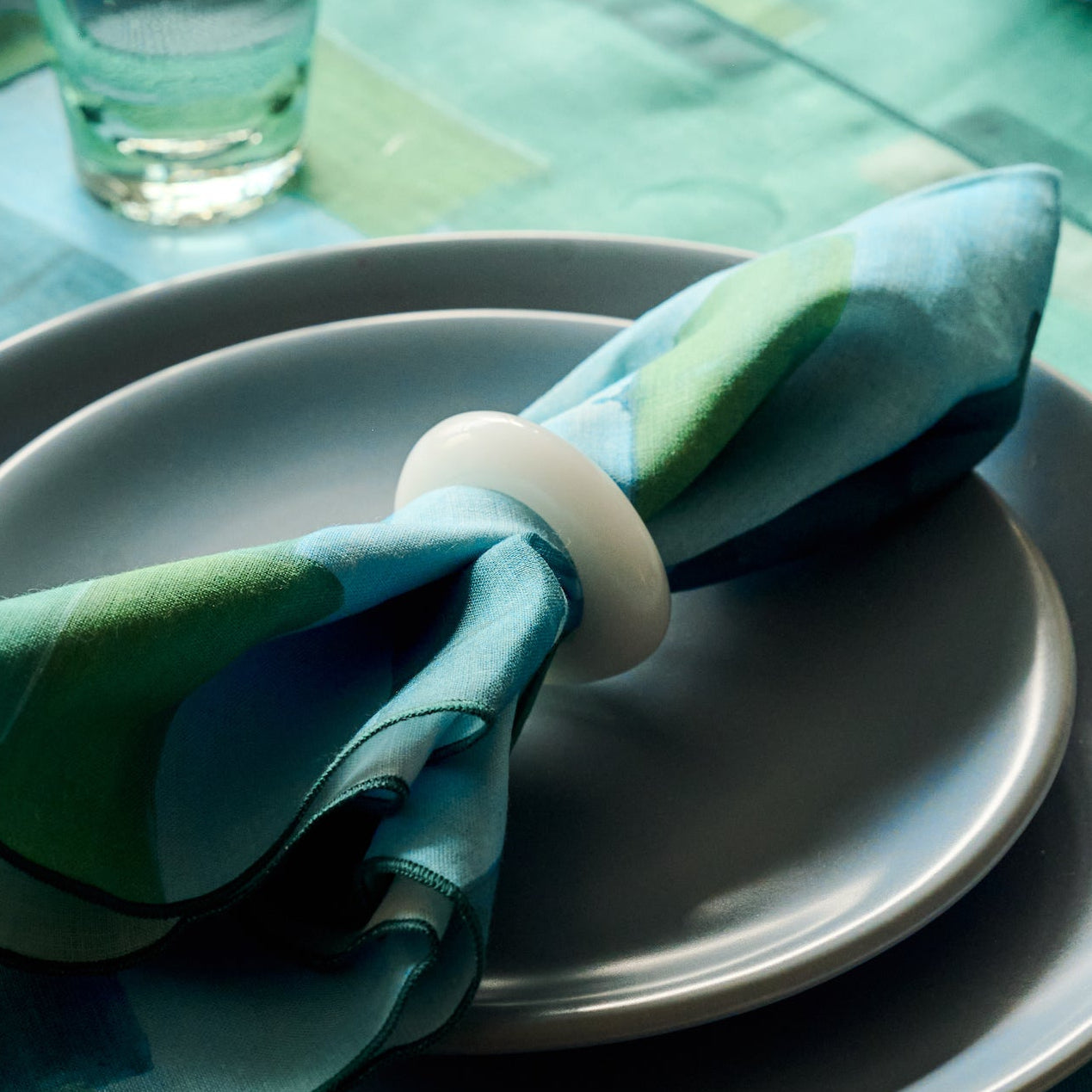 Blue Tapestry linen placemat set of 4 flat lay close up detail - Goldie Home