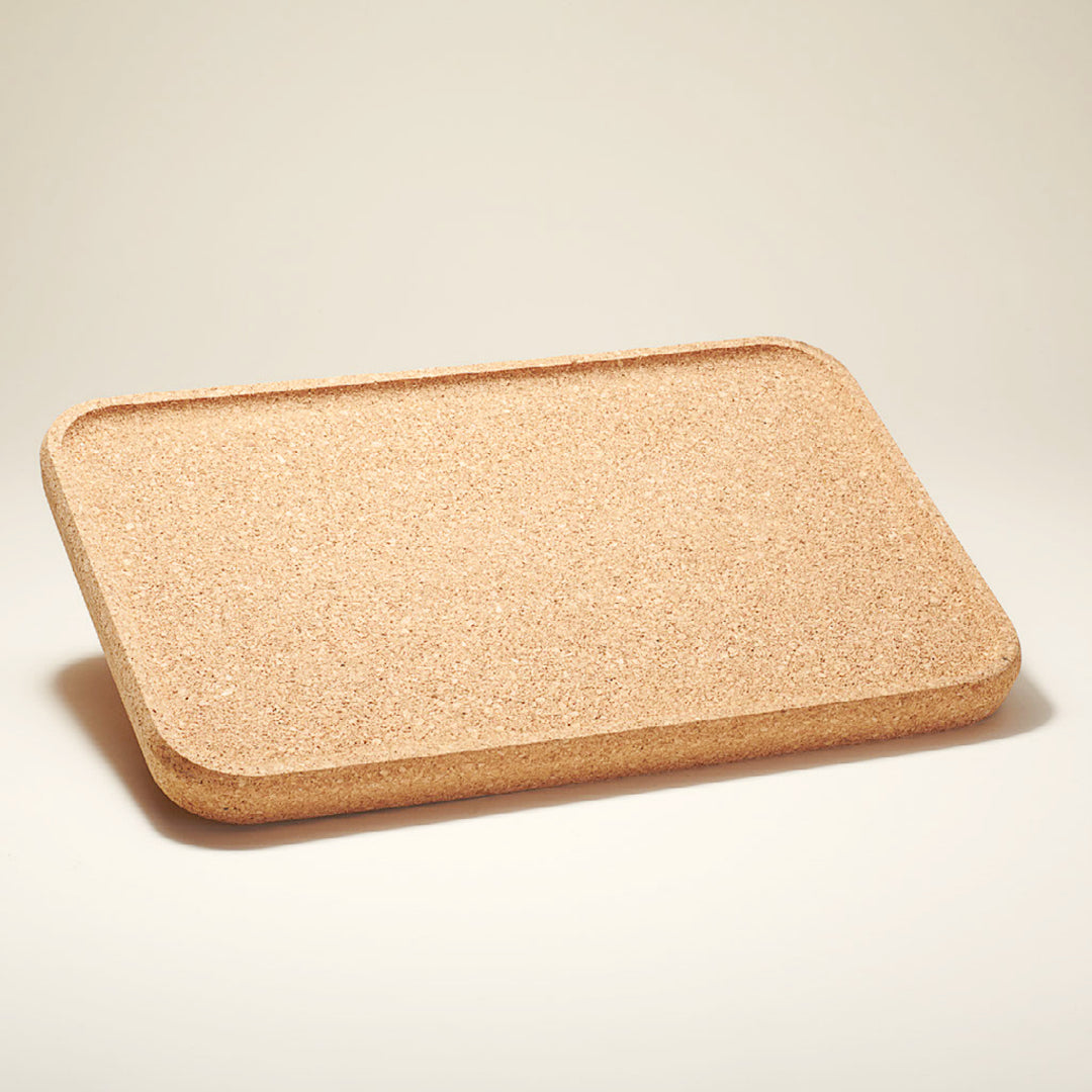 a piece of luggage sitting on top of a white surface 