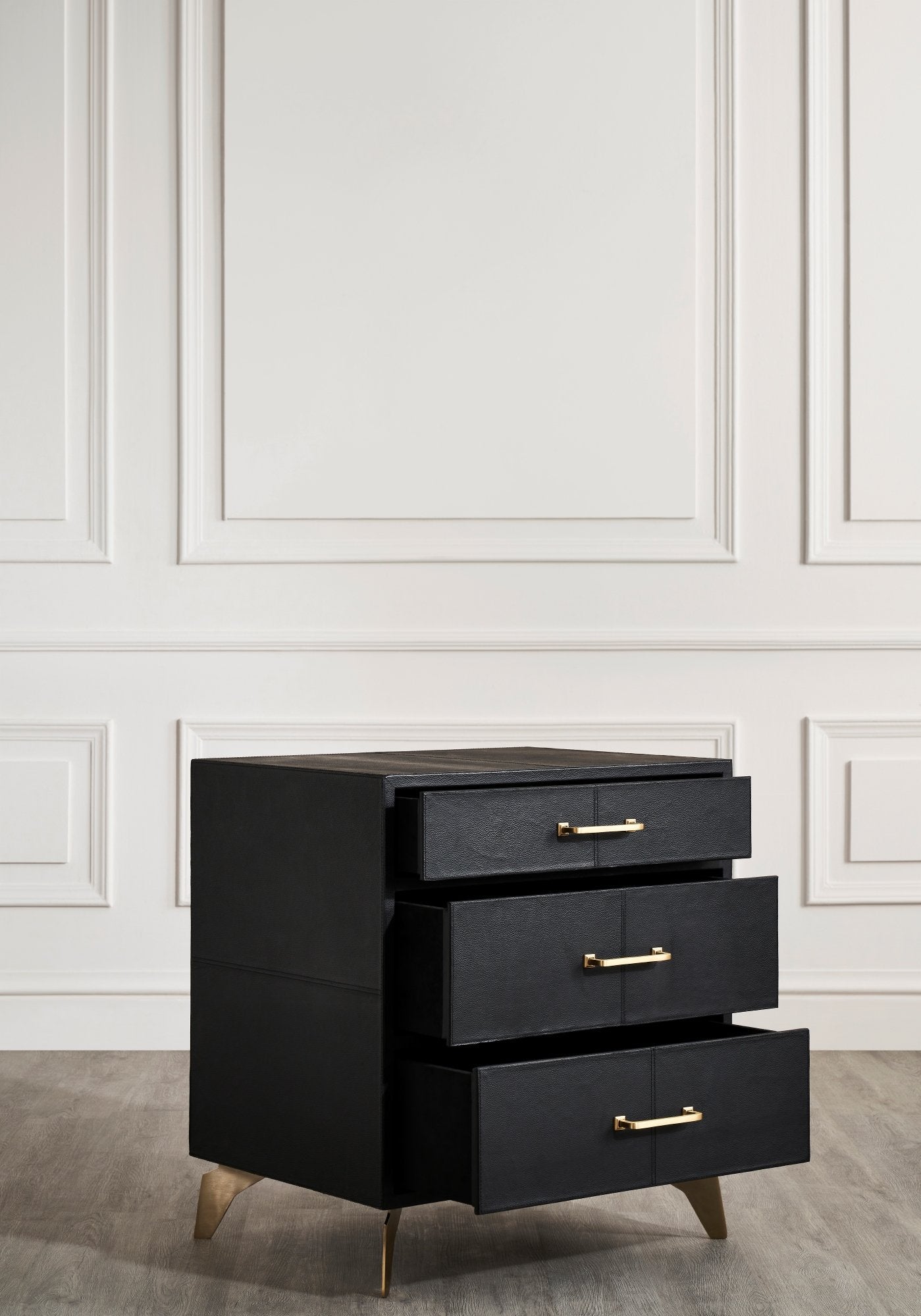 FN-5200-262028_5|Elegant black leather furniture dresser with three open drawers, revealing ample storage and stylish gold-toned hardware.