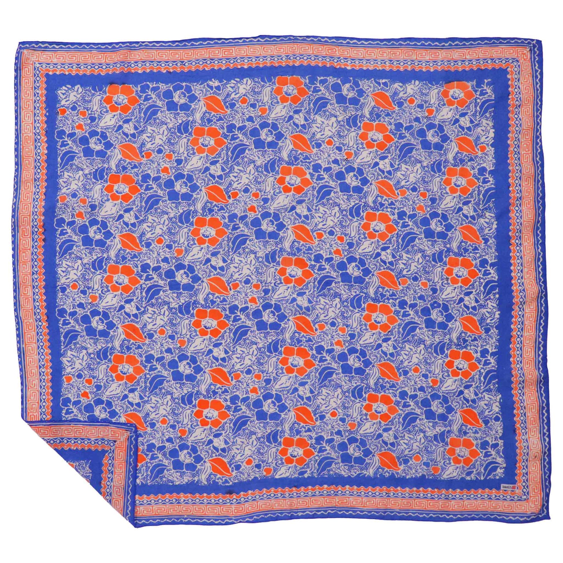 Floral patterned bandana with blue, orange, and white colors on a white background