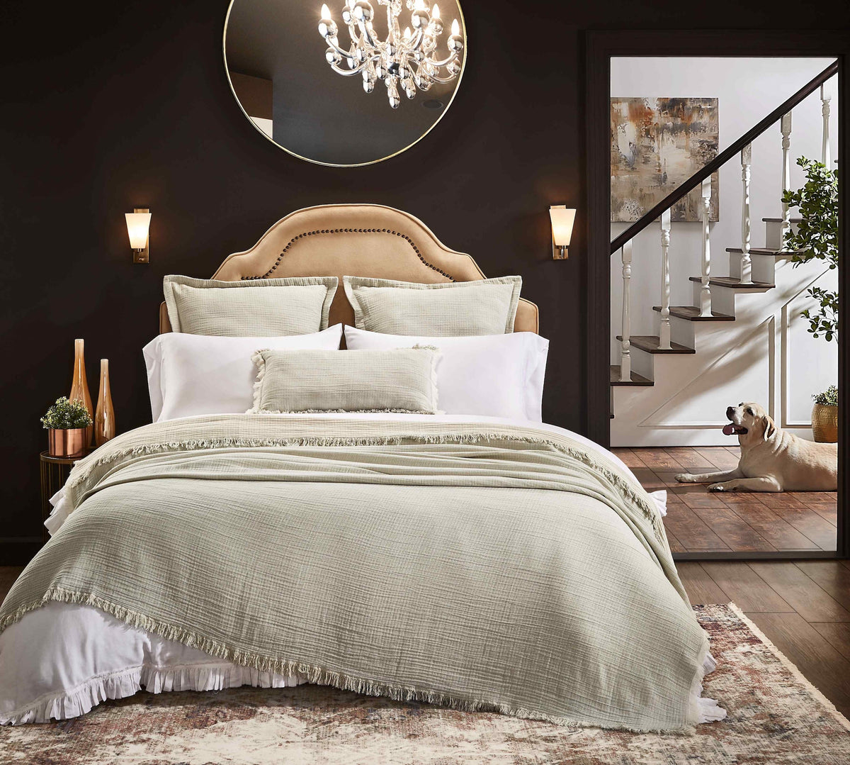 BT-111-9496_2|Elegant, textured sage green blanket with fringe detail covers a luxurious bed, enhancing bedroom comfort and style.