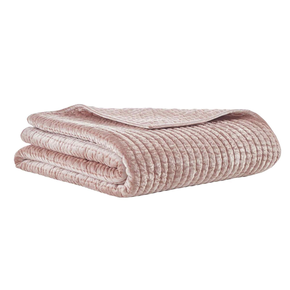 QT-354-9496_1|Soft dusty pink velvet quilt, elegantly folded. Plush channel-quilted texture, adds warmth and luxury to bedding.