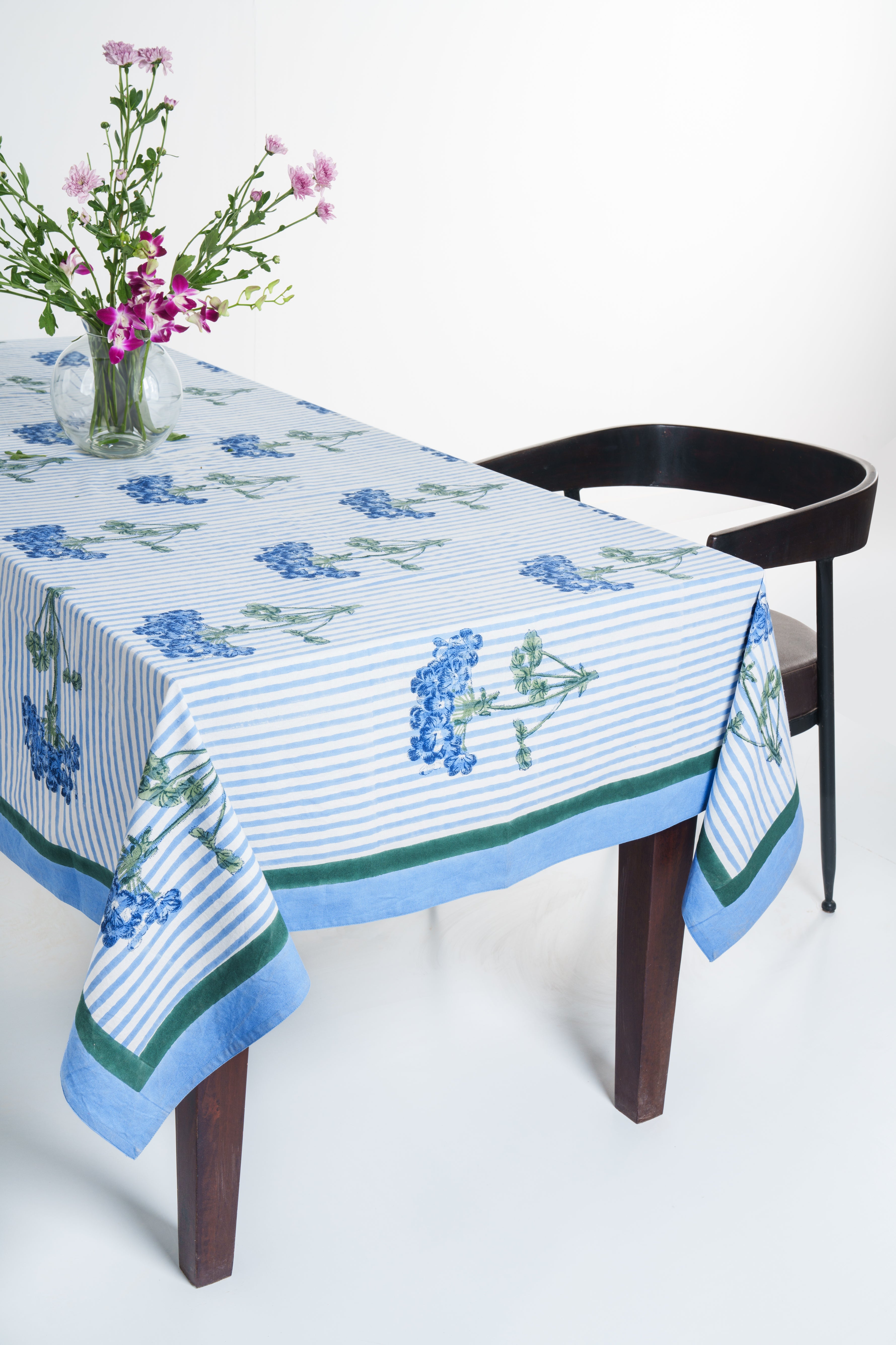 Inner Child blue hydrangea blockprint striped tablecloth on wooden table